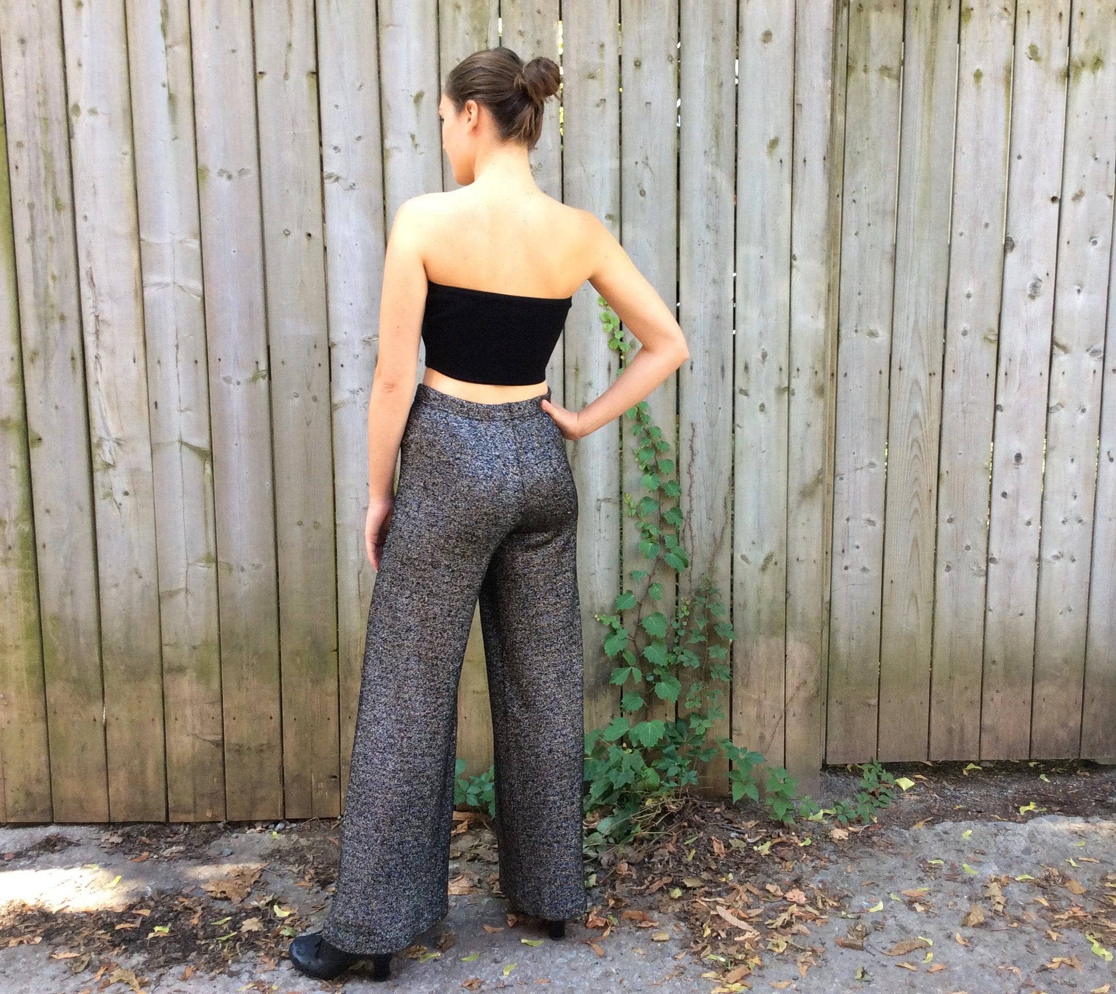 Back view of 1970s High Waisted Silver Knit Wide-leg Pants Size Small/Medium, sold by bohemevintage.com Montréal