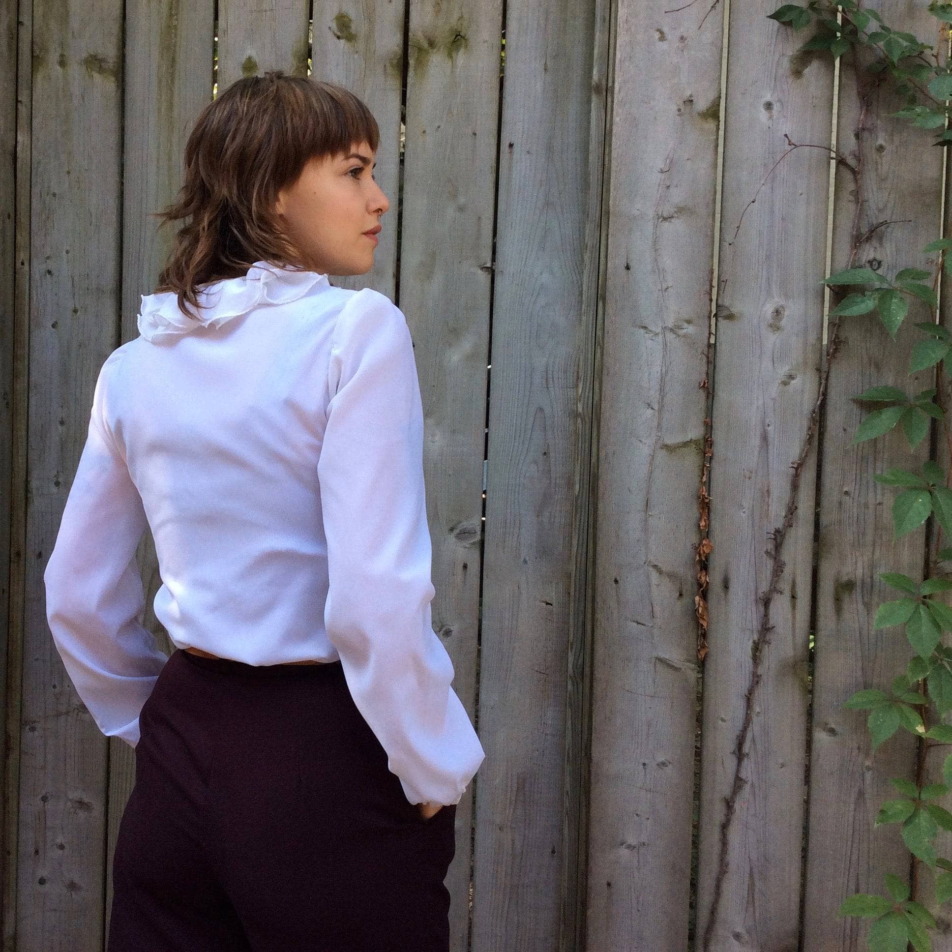 Back view of 1970s Jabot Collar Long Sleeve White Shirt Size Small Medium sold by bohemevintage.com