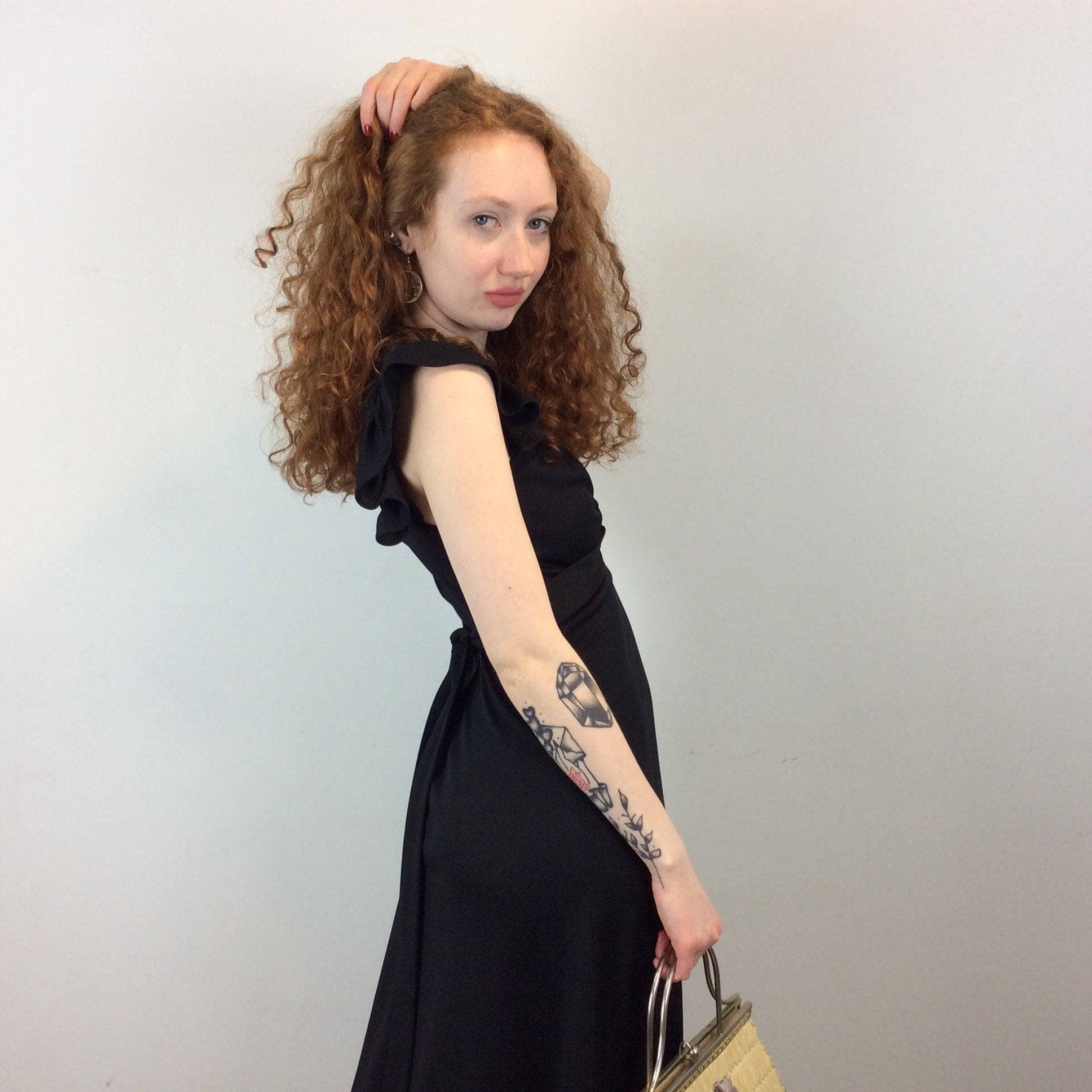 Side view of 1970s Joseph Ribkoff Black Polyester Maxi Dress Size Small sold by bohemevintage.com