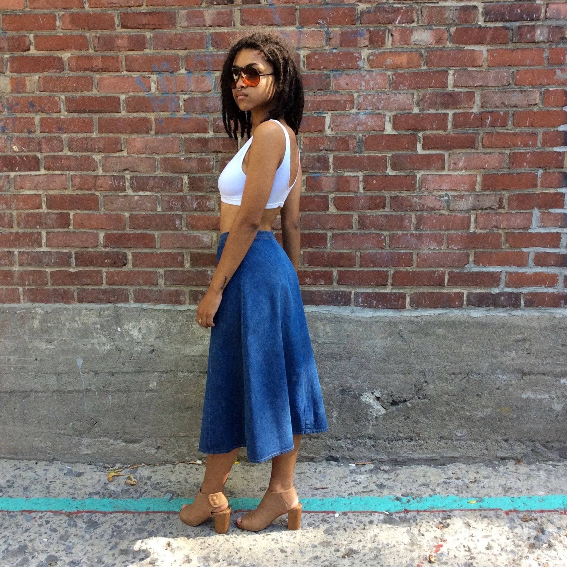 Side view 1970s Midi Length Button-up Jean Skirt by brand UFO sold by bohemevintage.com Montreal