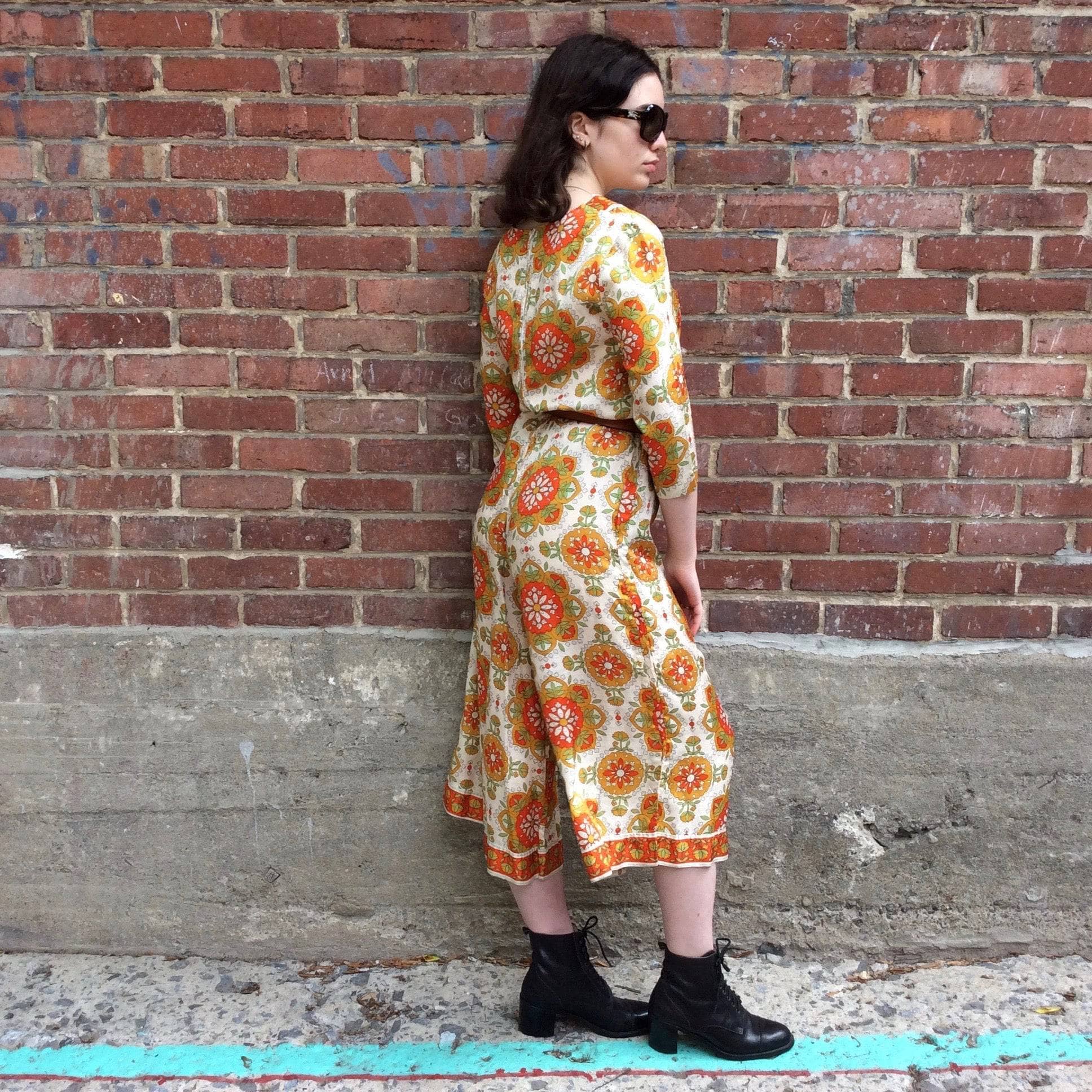 Side view of 1970s Wide Leg Bold print Jumpsuit Size Small/Medium, sold by bohemevintage.com Mo