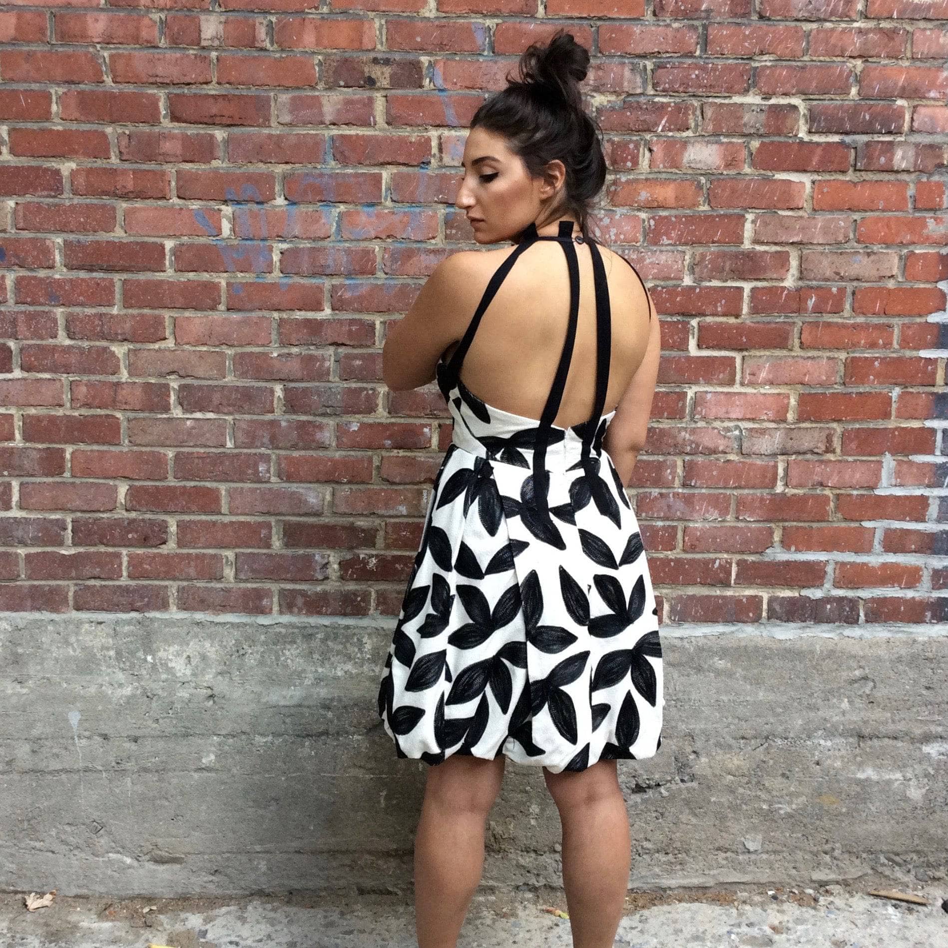 Back View of 1980-1990s "Georges Lévesque" Couture Open-back Bubble Hem Dress, sold by bohemevintage.com Montréal