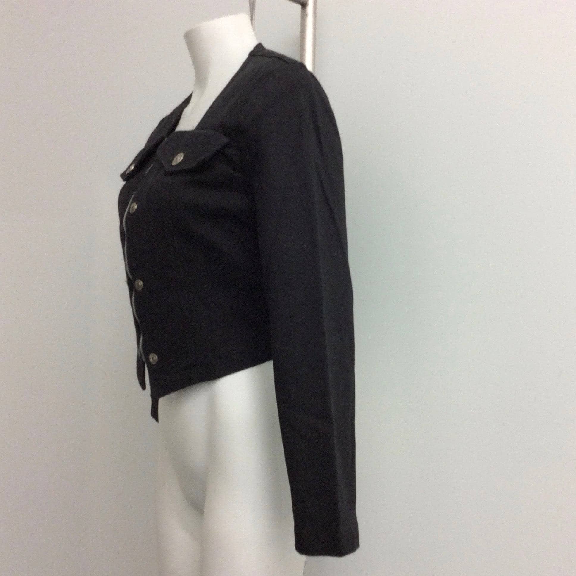 Side View of 1980-90s Black Denim Crop Jacket with Metal Zipper, sold by bohemevintage.com Montréal