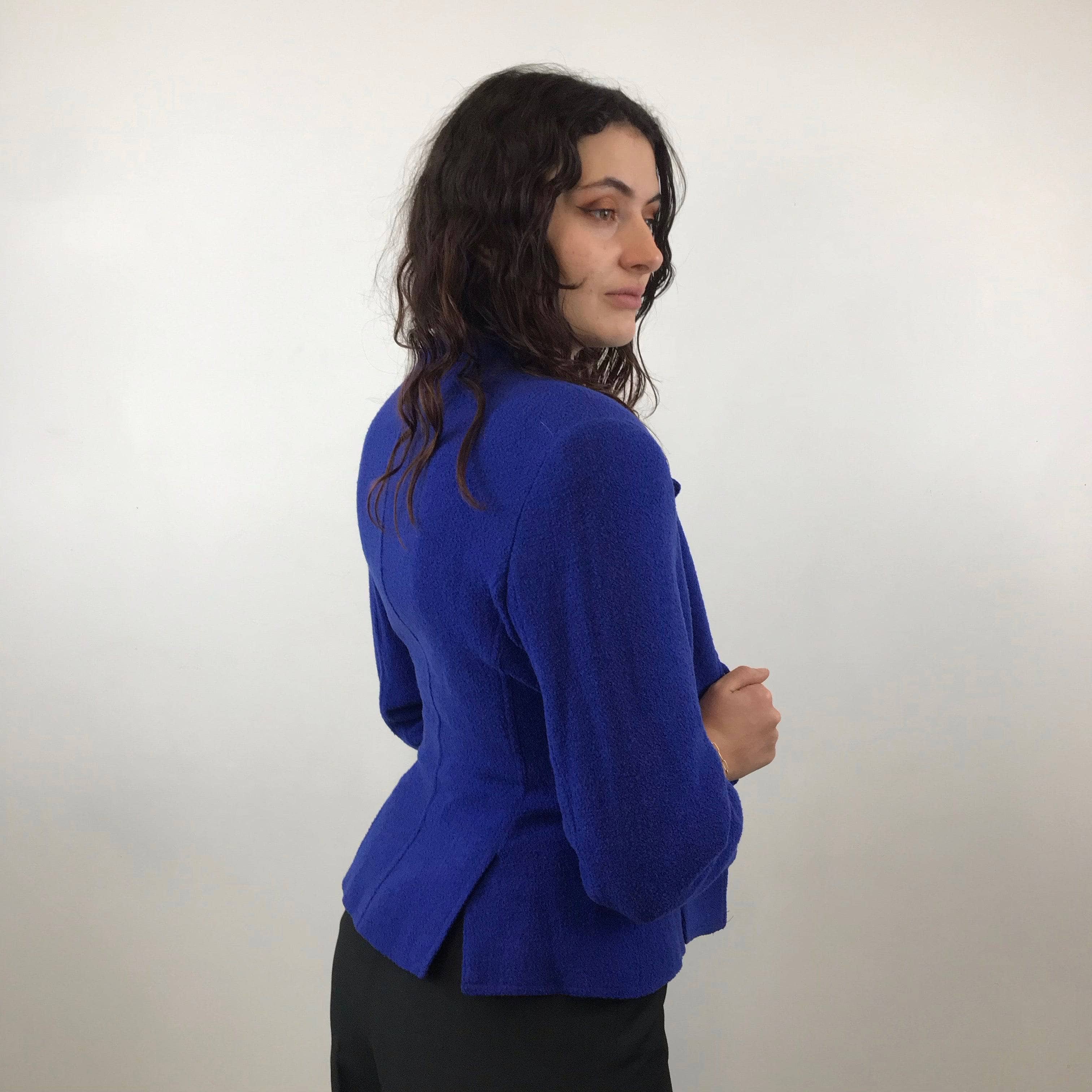 Side view of 1980s/1990s Louis Féraud Boucle Wool Fitted Blazer Size Medium sold by bohemevintage.com