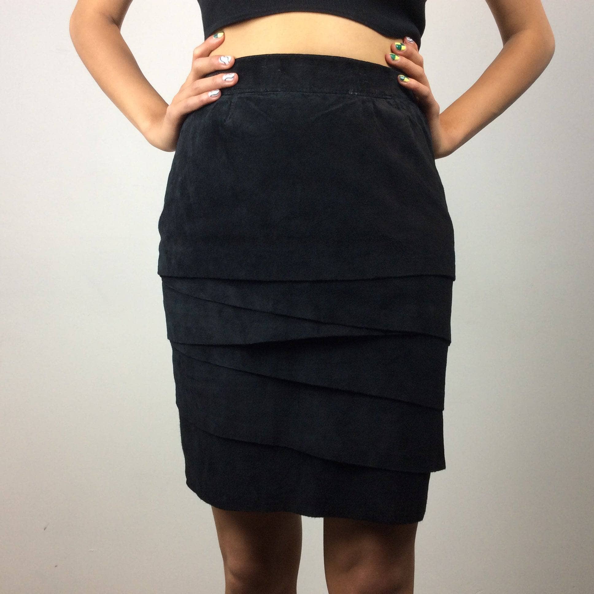 Close-up view of 1980s-90s High Waist Black Layered Suede Skirt Size Small sold by bohemevintage.com Montreal