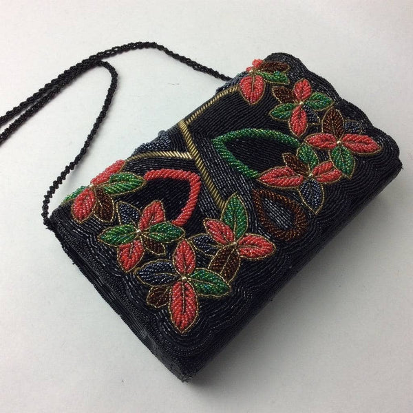 Black embroidered clutch bag top