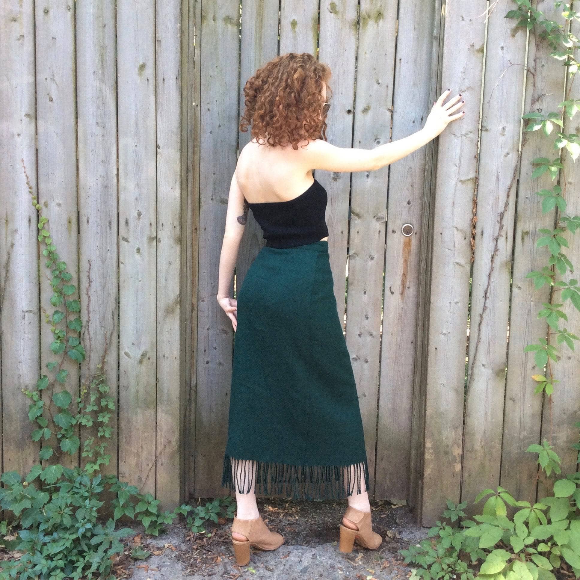 Back view 1980s "Benetton" High waist wrap fringe green Wool skirt, for sale at bohemevintage.com Montréal