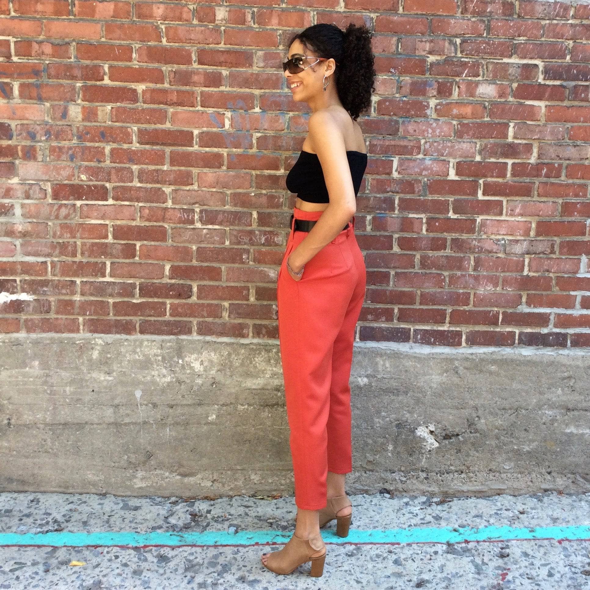 Side view of 1980s Brick Colour High Waisted tapered leg Pleated Pants Size small sold by bohemevintage.com