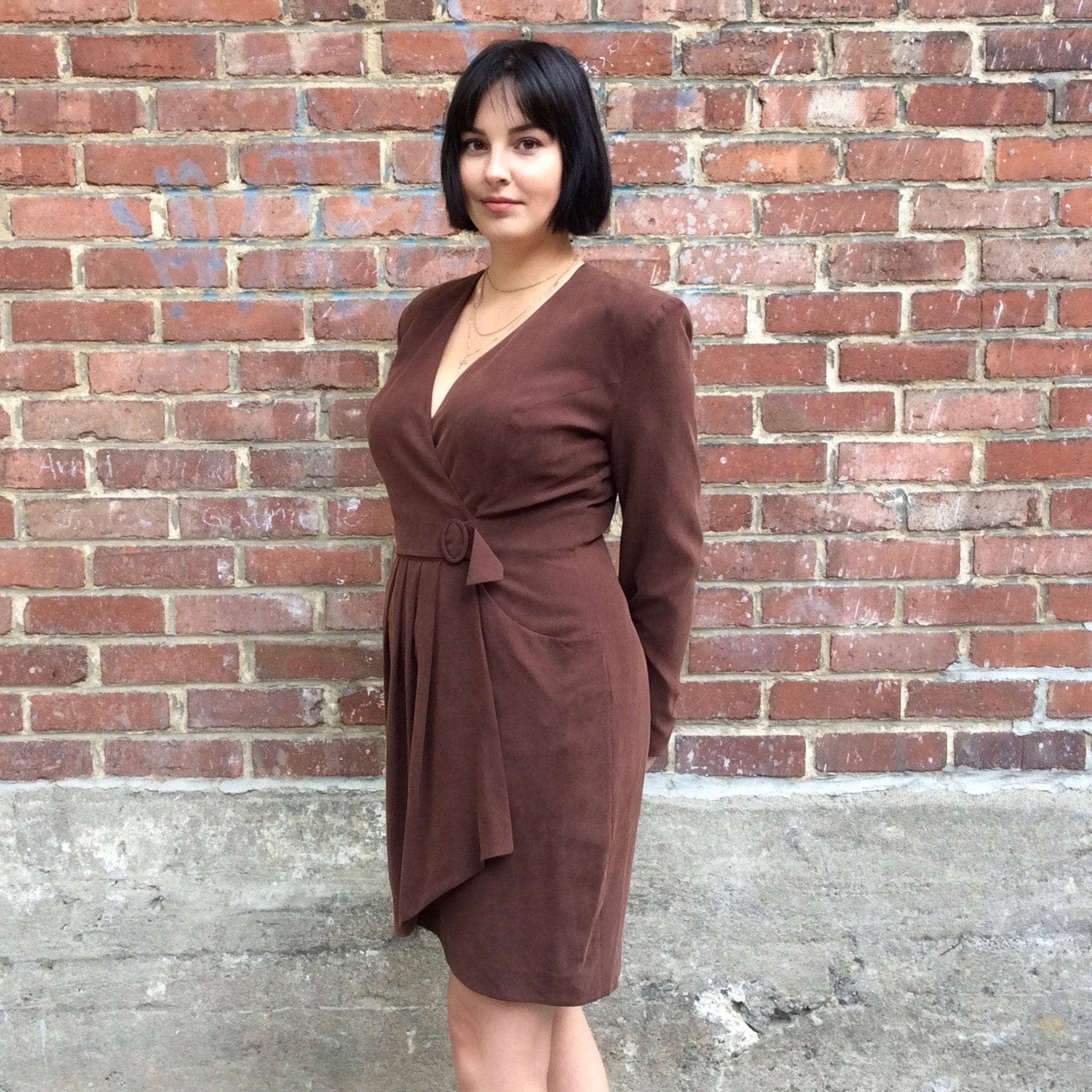 Side view of 1980s Brown Long-Sleeve Wrap Silk Dress size Medium made in France by Mathilde J. Rondineau Paris size Medium sold by bohemevintage.com Montreal