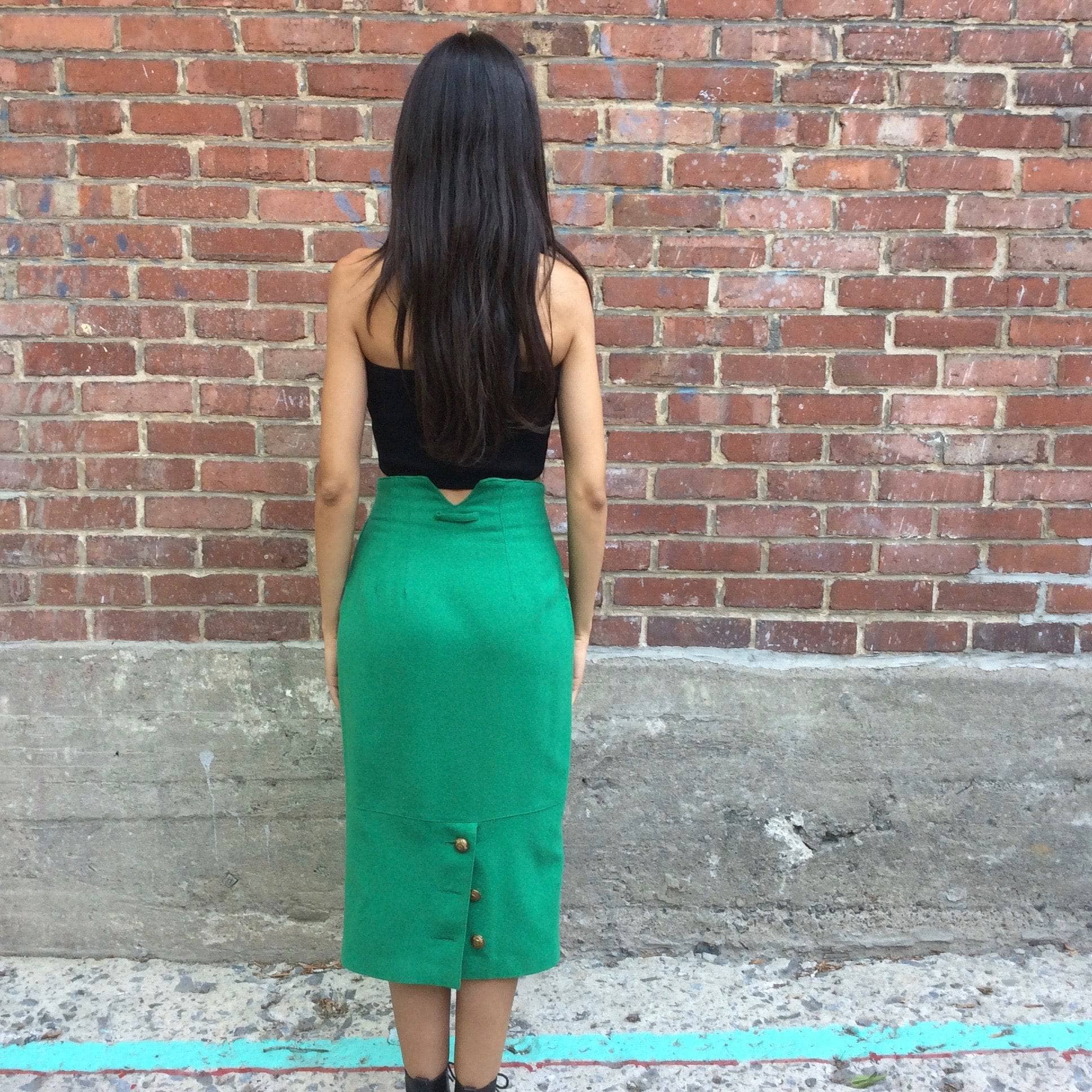 Back view of 1980s Emerald Midi-Length High Waist Wool Pencil Skirt , sold by bohemevintage.com Montréal