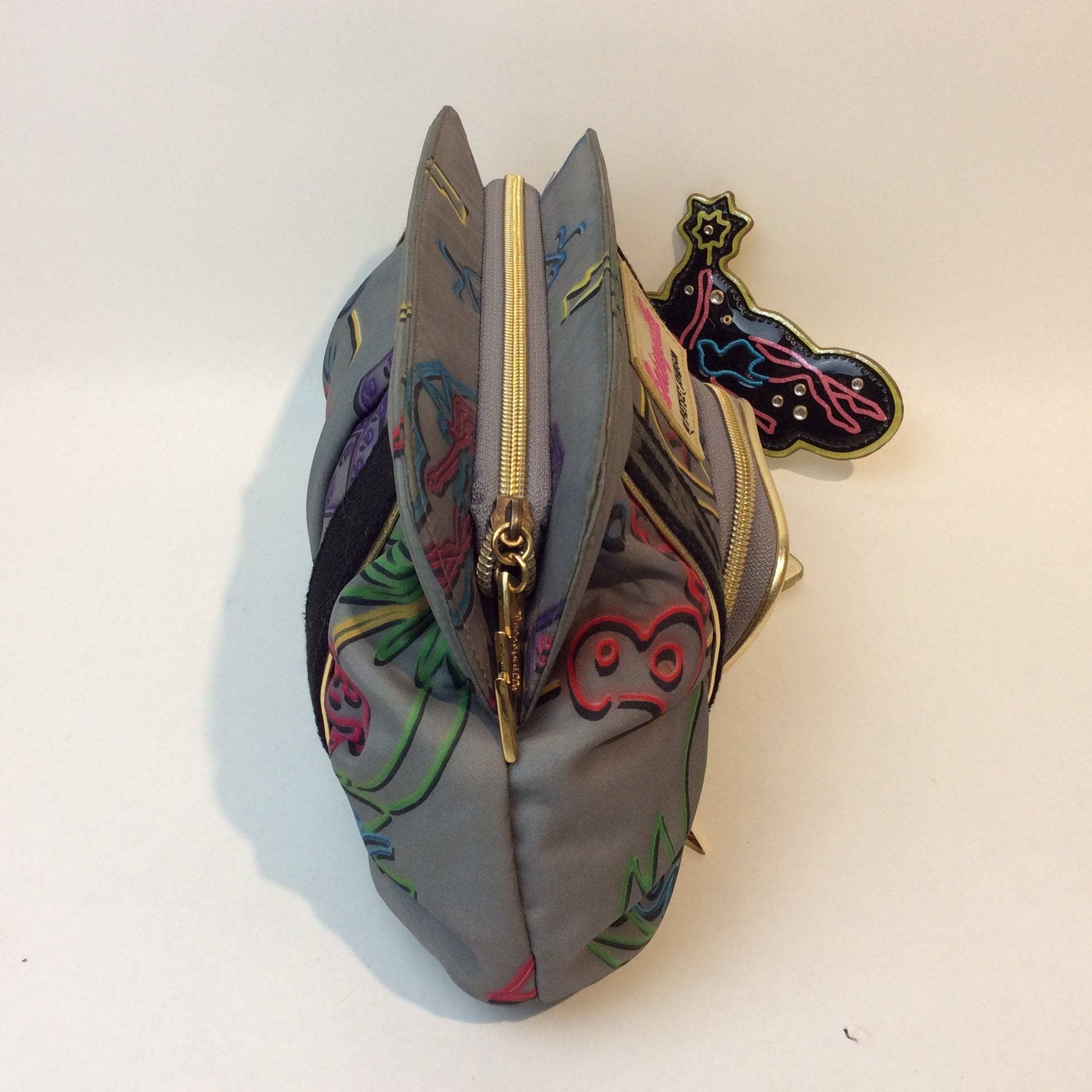 Side and top view of 1990s Betseyville Deadstock Designer Clutch Handbag from Betsy Johnson sold by bohemevintage.com