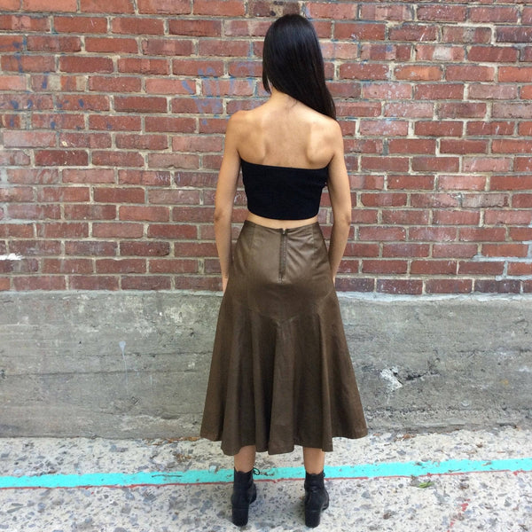 Back view Lily Simon 1990s Midi Length Flared Leather Skirt size Small sold by bohemevintage.com