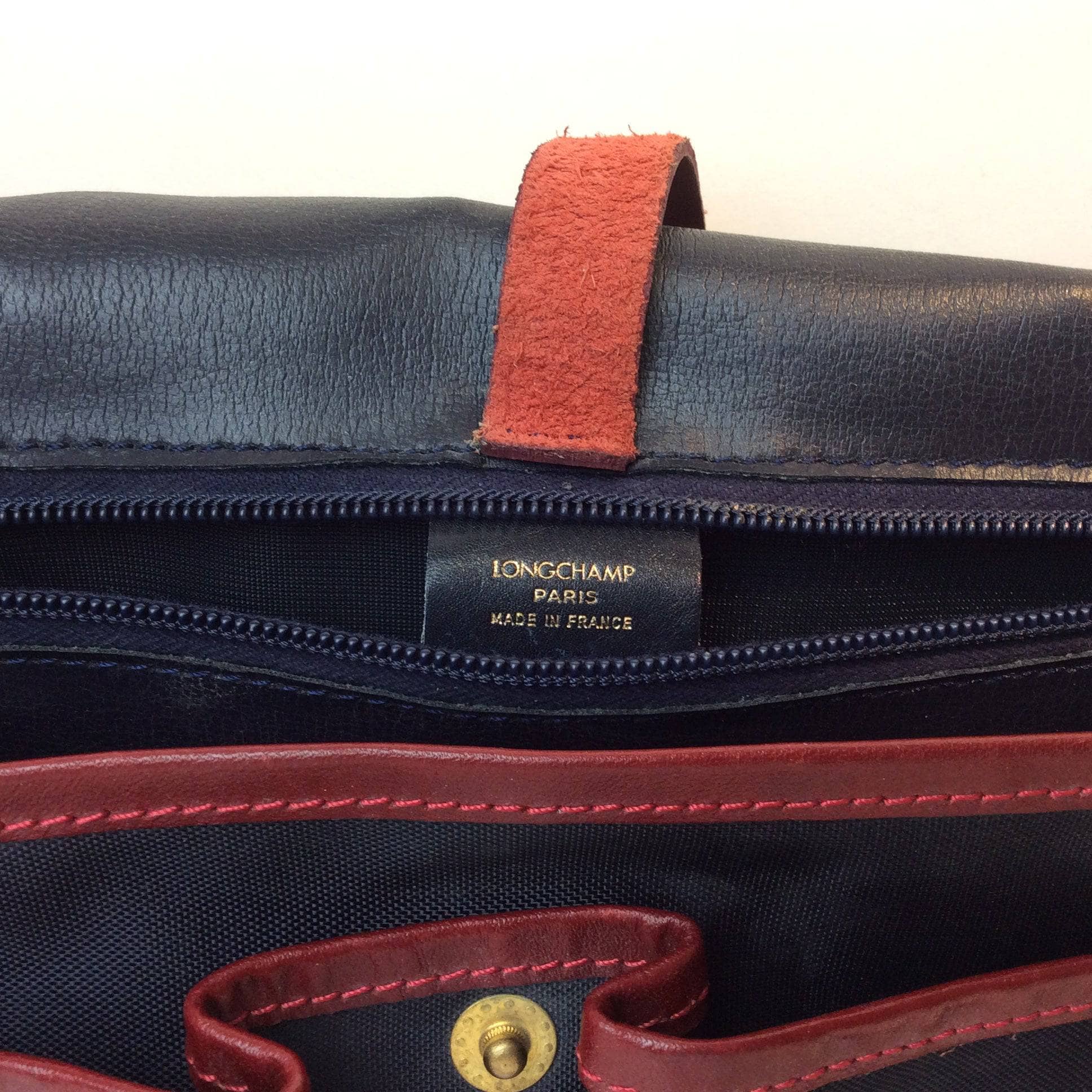 1990s | Designer Medium Navy Messenger Shoulder Bag | Longchamp PARIS. Sold by bohemevintage.com