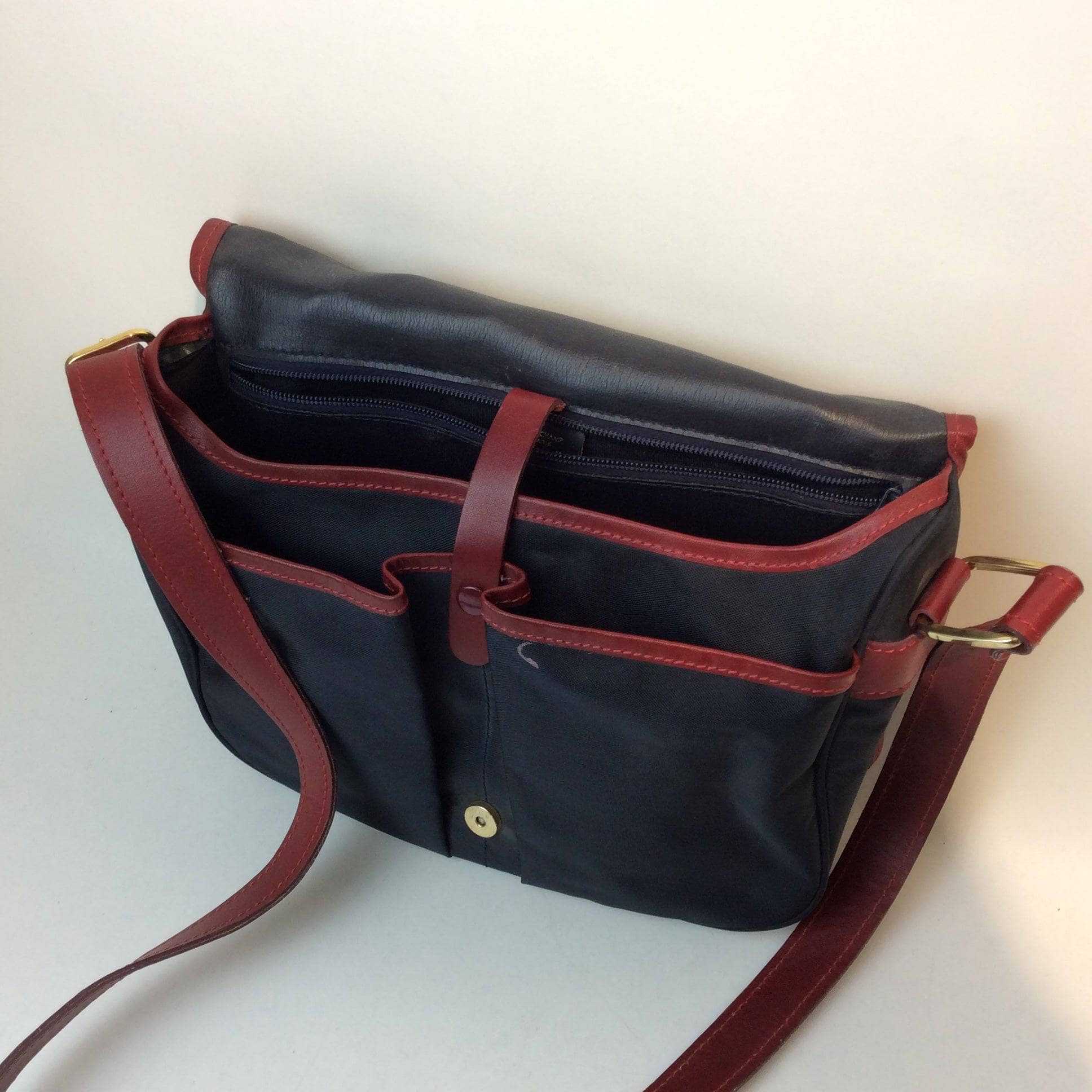 1990s | Designer Medium Navy Messenger Shoulder Bag | Longchamp PARIS. Sold by bohemevintage.com