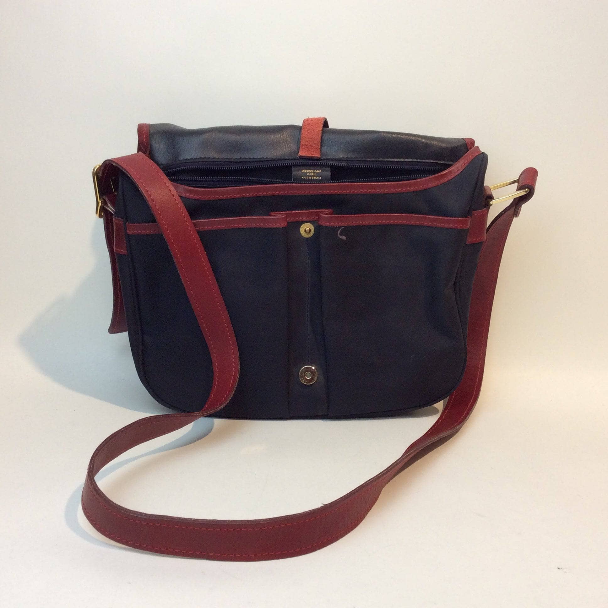 1990s | Designer Medium Navy Messenger Shoulder Bag | Longchamp PARIS. Sold by bohemevintage.com