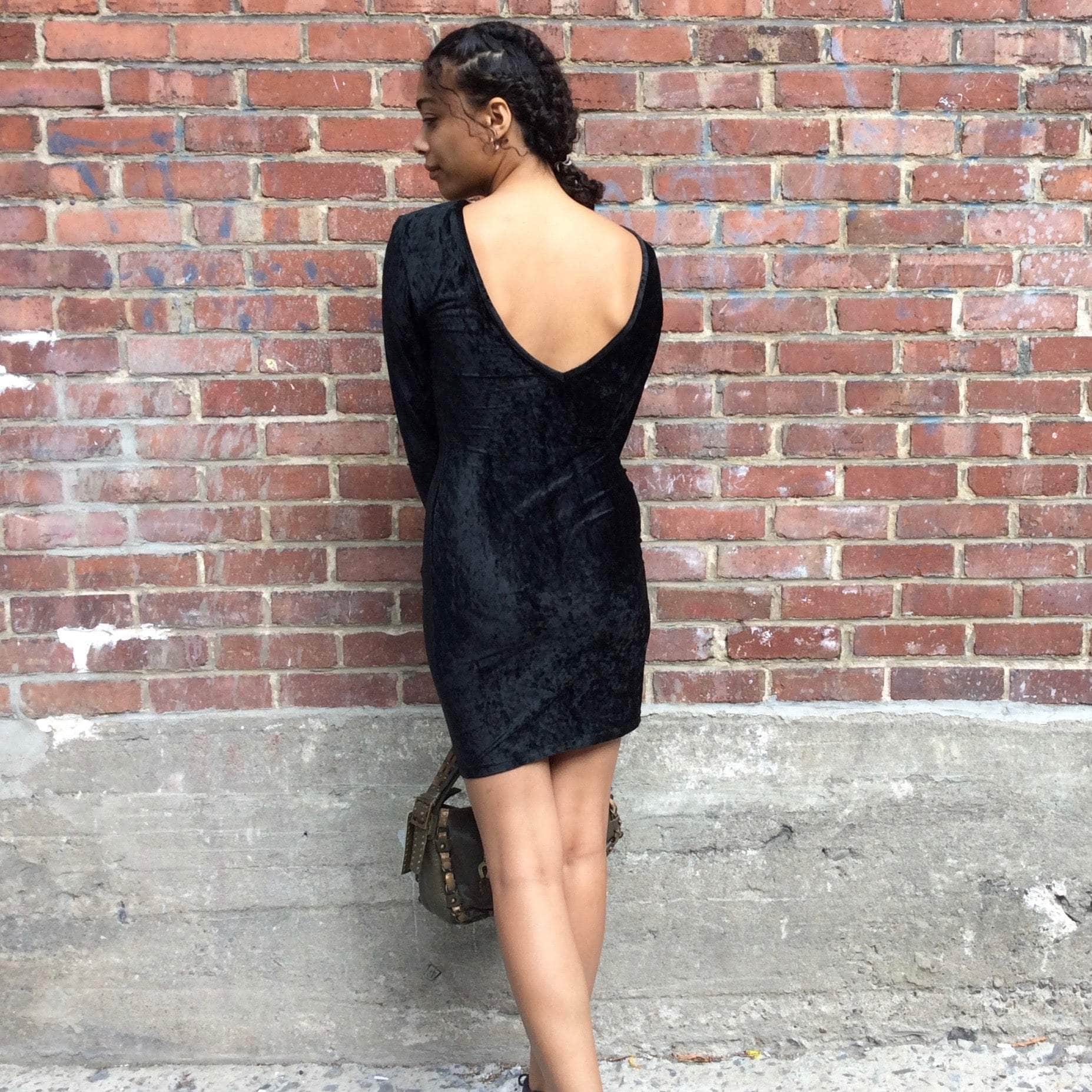 Back View of 1990s Open Back Black Velvet Bodycon Mini Dress Size Small sold at bohemevintage.com Montreal