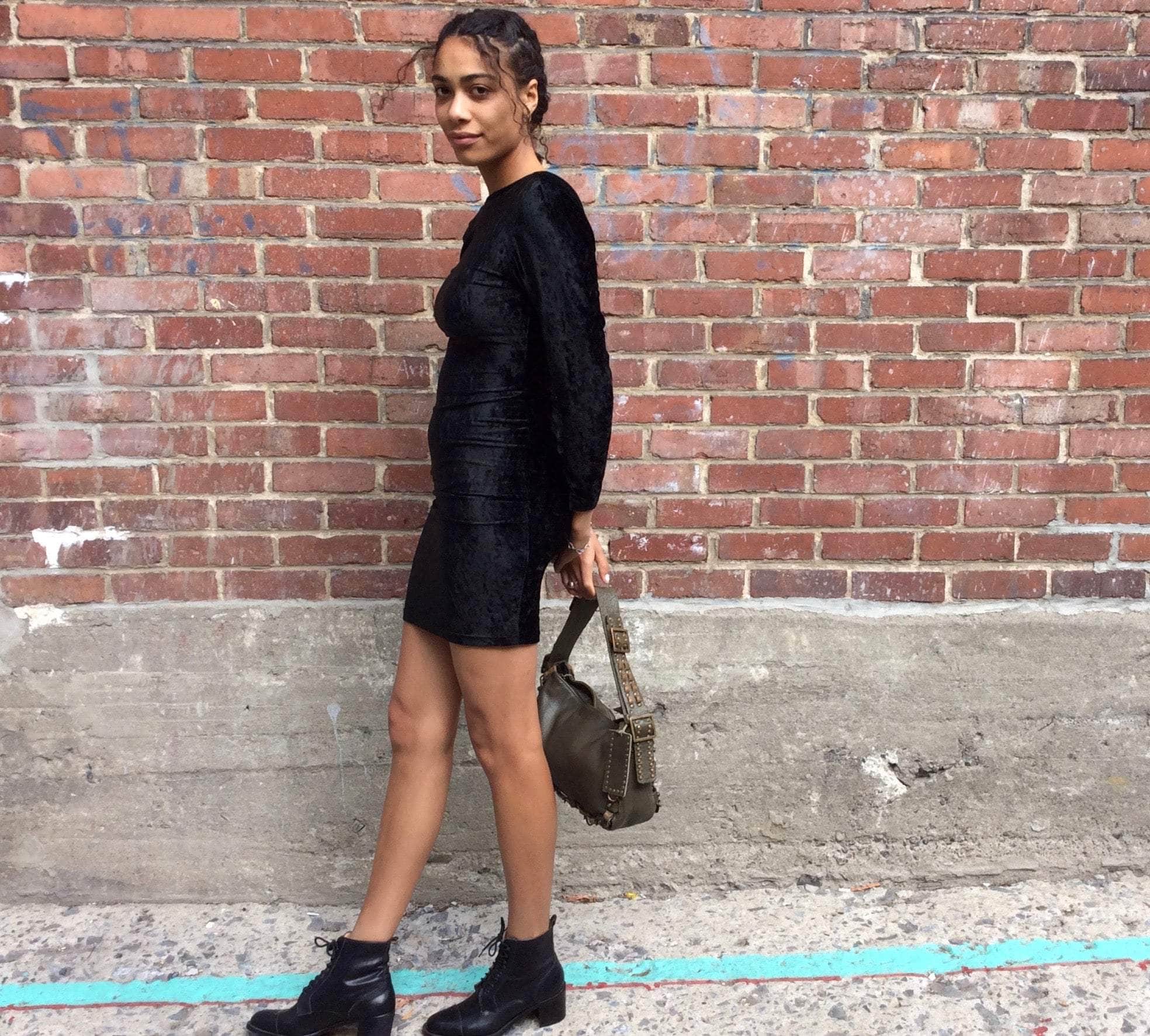 Side View of 1990s Open Back Black Velvet Bodycon Mini Dress Size Small sold at bohemevintage.com Montreal