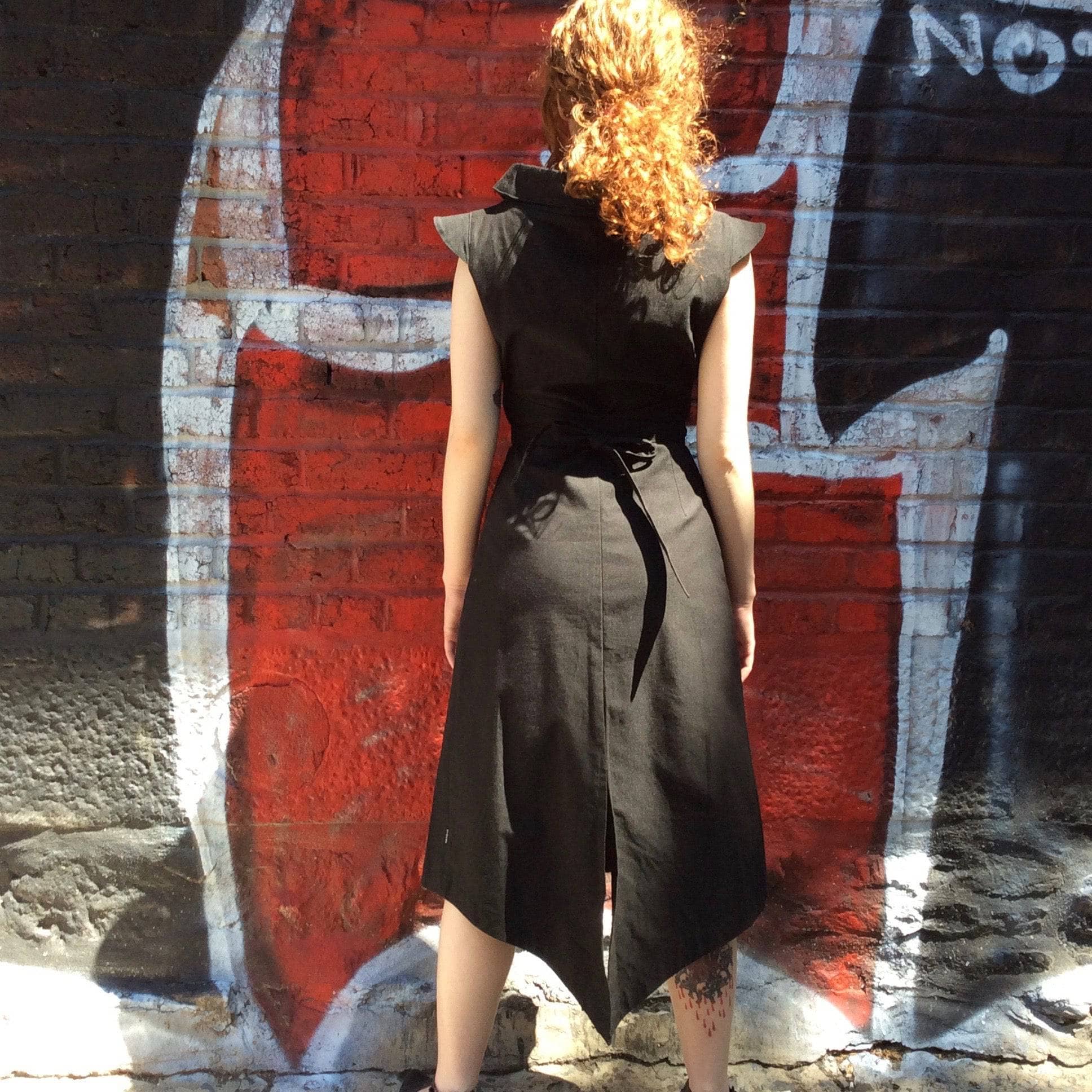 Back View of 2000s "Kitchen ORANGE" Black sleeveless cocktail dress size Small/Medium, sold by bohemevintage.com Montreal