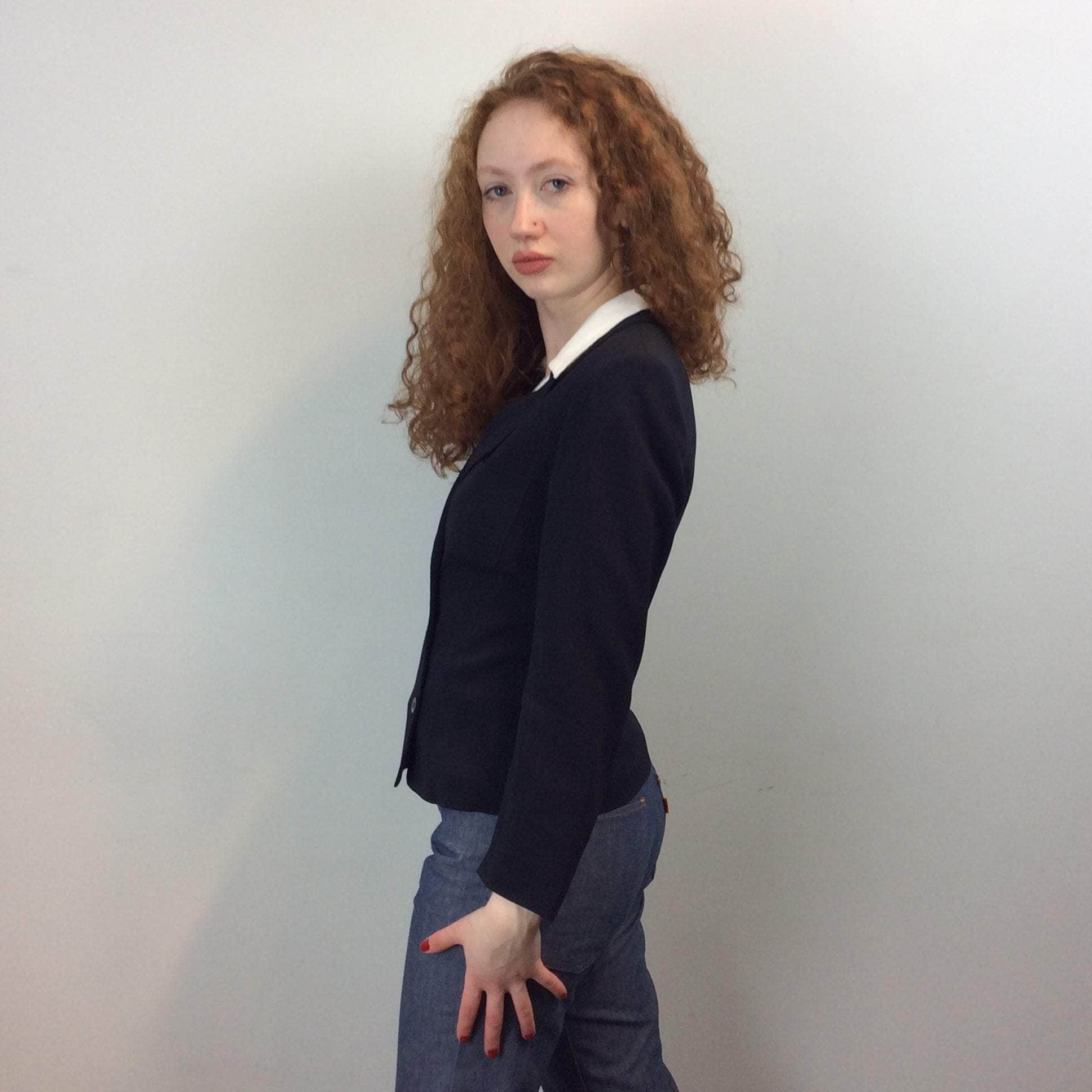 Side view of Cacharel Navy Double Breasted Blazer Size Small sold at bohemevintage.com Montreal