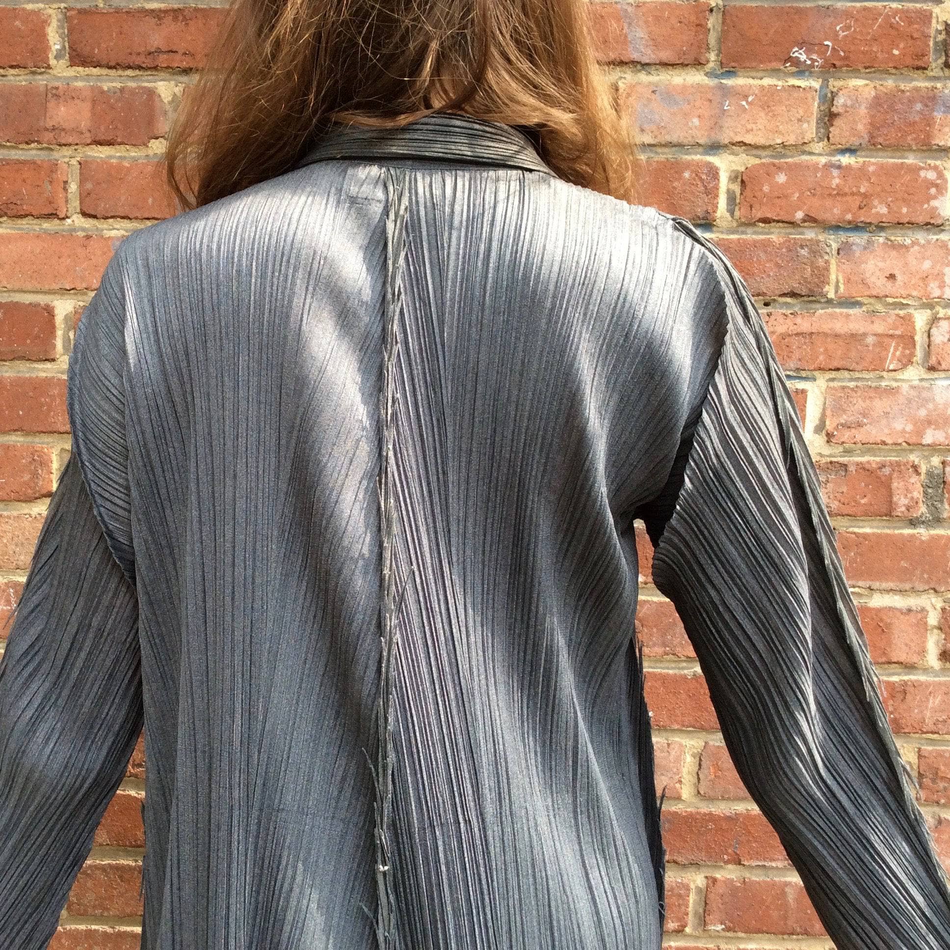 Close-up of Back View of Issey Miyake Long Asymmetrical Light-Weight Crinkle Coat, sold by bohemevintage.com Montréal