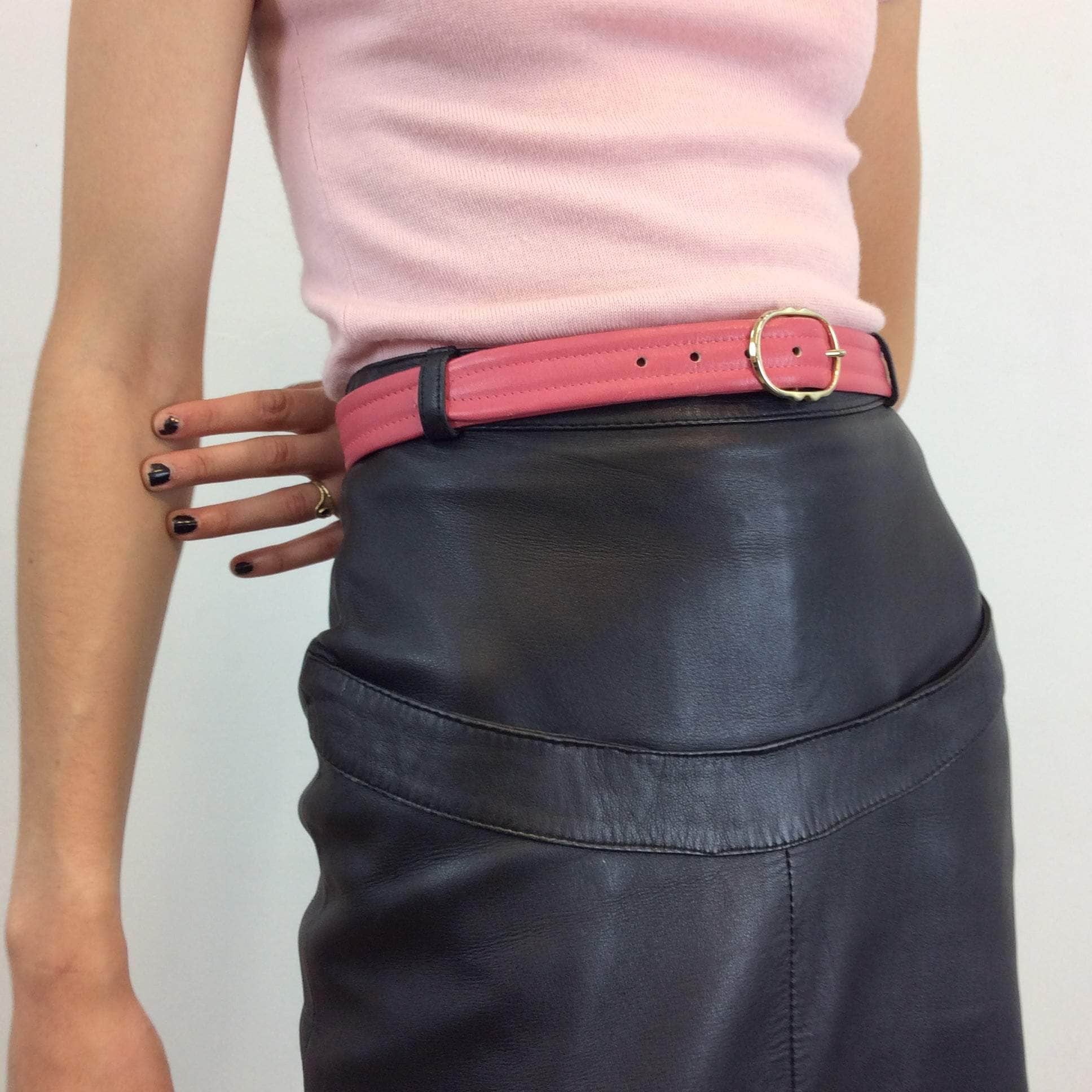 Close up view of1990s High-Waisted Straight Cut Midi Black Leather Skirt Size extra small- small sold by bohemevintge.com