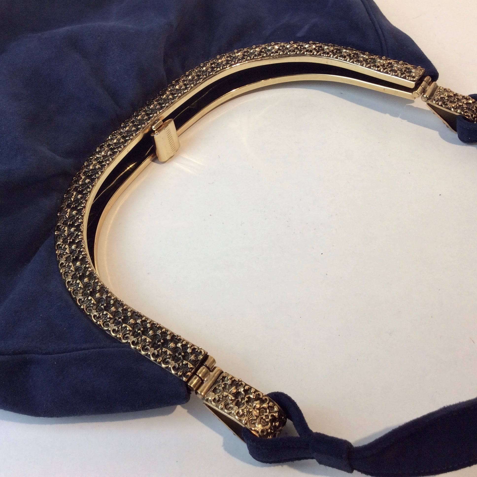 1950s Blue Suede Crescent Handbag with Detailed Gold Frame Sold at bohemevintage.com Montréal