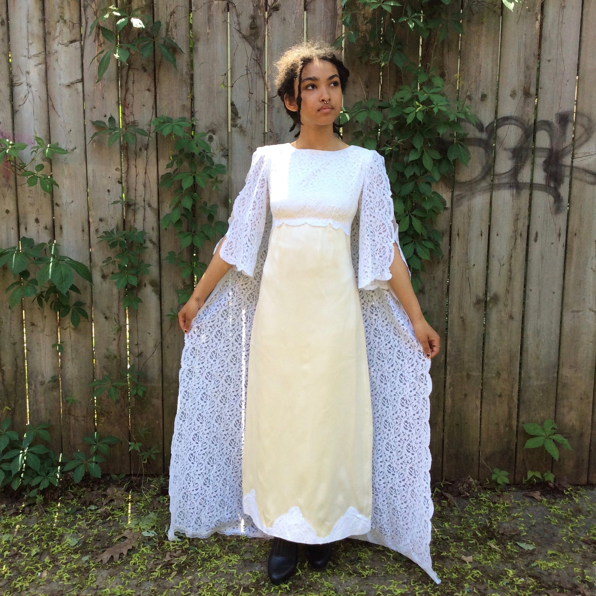 Front view of 1960s-1970s Ivory Wedding Gown with Train
Size extra small
sold at bohemevintage.com, Montréal