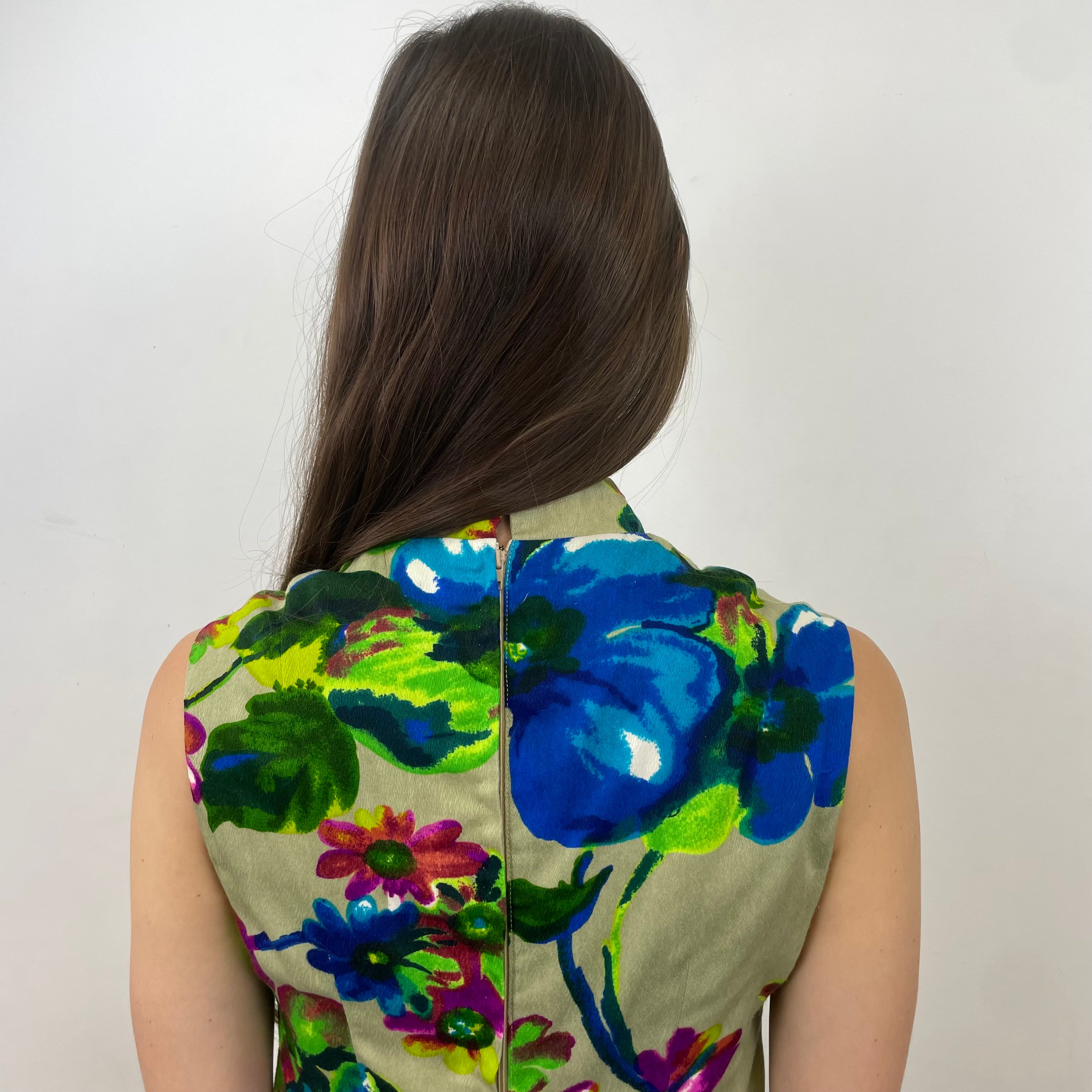 Boheme Vintage 1960s handmade floral tie-neck shift dress with textured bold-print fabric, V-neck opening, and relaxed silhouette.