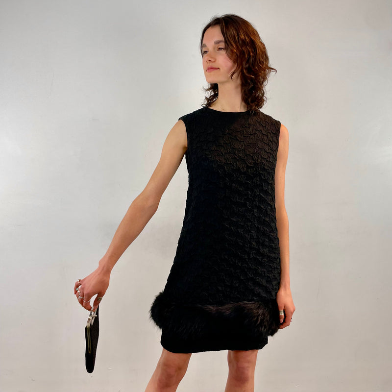 Front view of 1960s Sleeveless Black Shift Dress with Fur Trim Size Small sold at bohemevintage.com montreal