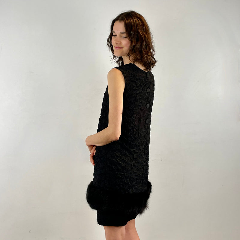 Side and back view of 1960s Sleeveless Black Shift Dress with Fur Trim Size Small sold at bohemevintage.com Montreal