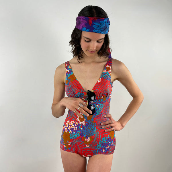 Front view of   1960s/70s One-piece Open Back Bathing Suit Size Small sold at bohemevintage.com, Montreal