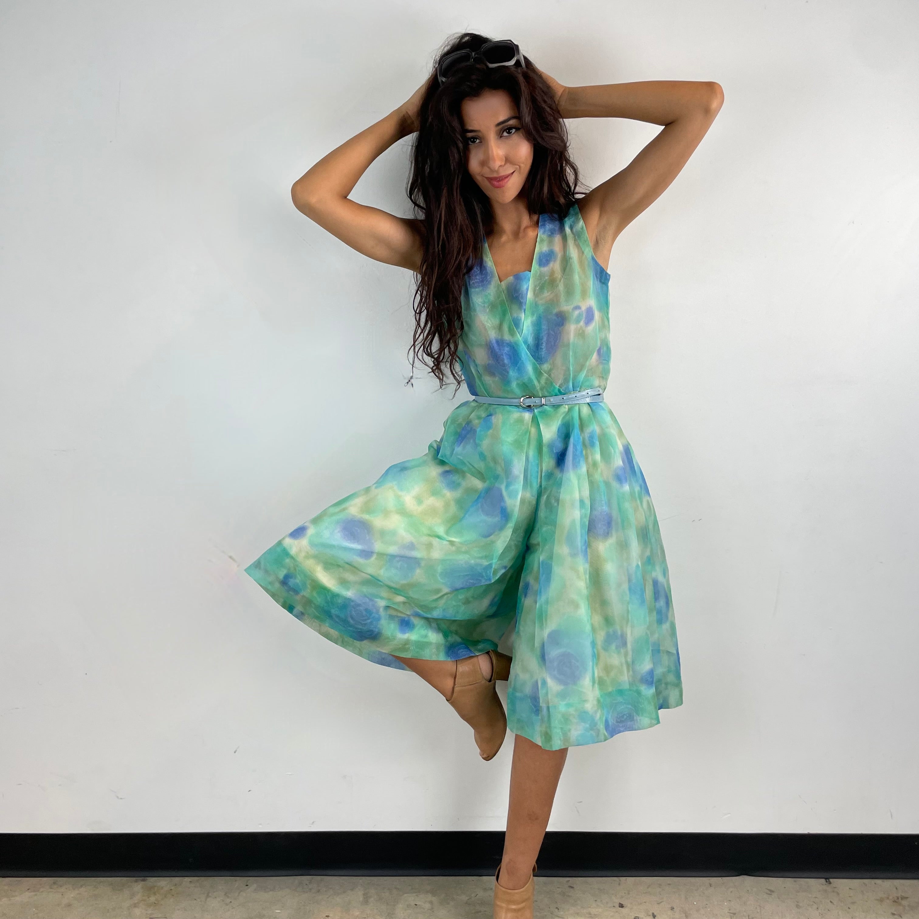 Front View of Boheme Vintage 1960s handmade floral culotte dress with sheer organza fabric, pleated wide-leg culottes, and cache-coeur neckline.