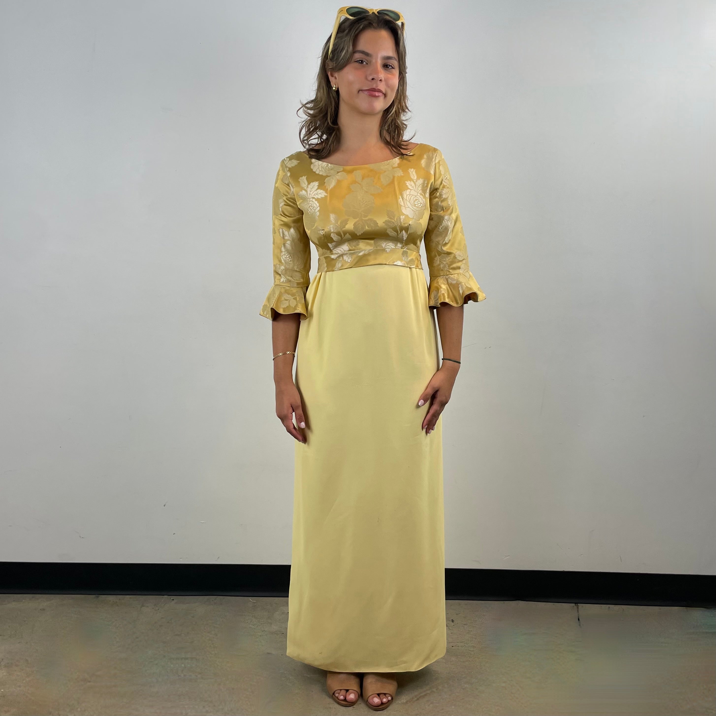Boheme Vintage 1960s gold brocade and yellow crepe empire waist gown with flounce sleeves and flowing skirt.