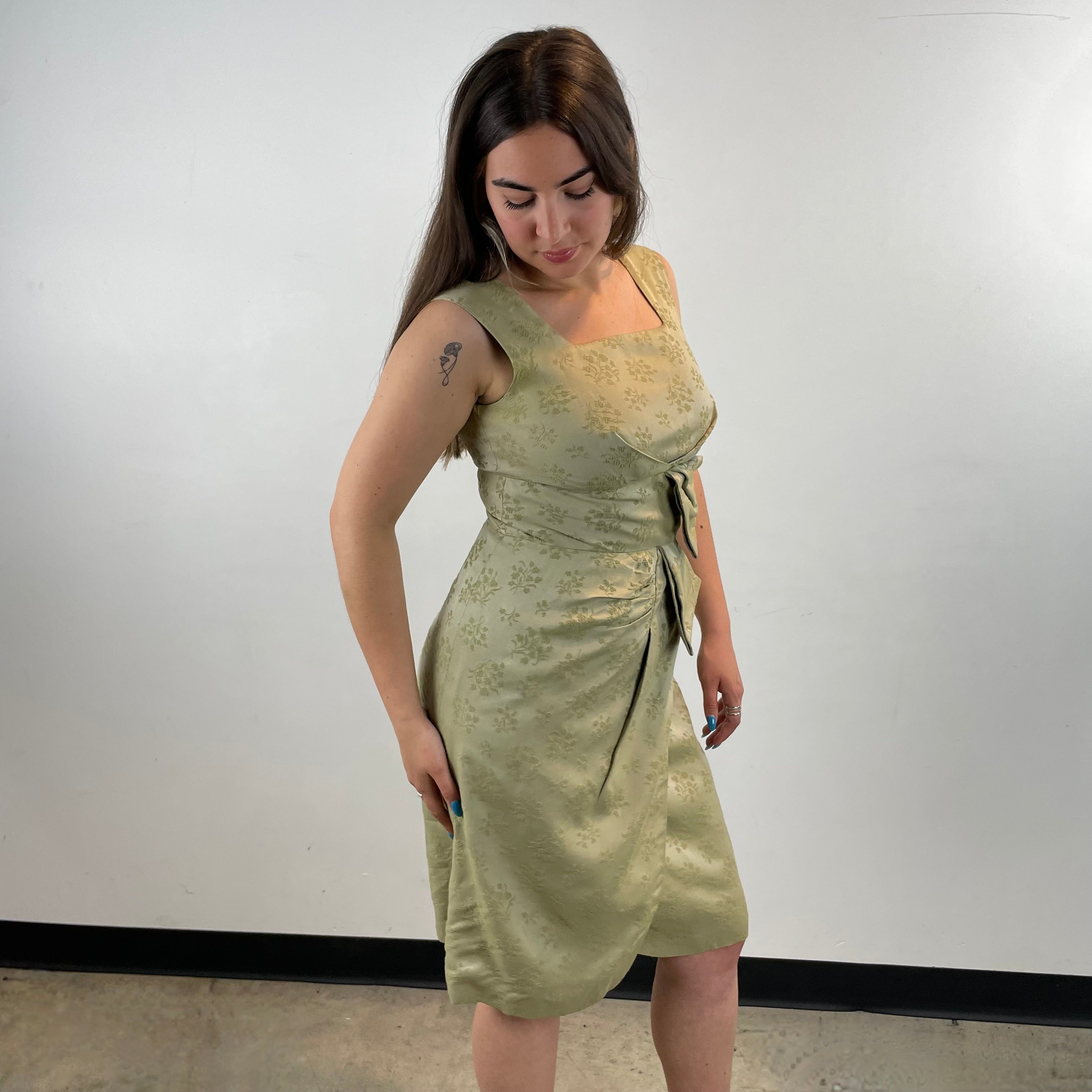 Side View of Boheme Vintage 1960s handmade brocade dress and bolero set with Peter Pan collar and pleated detailing.