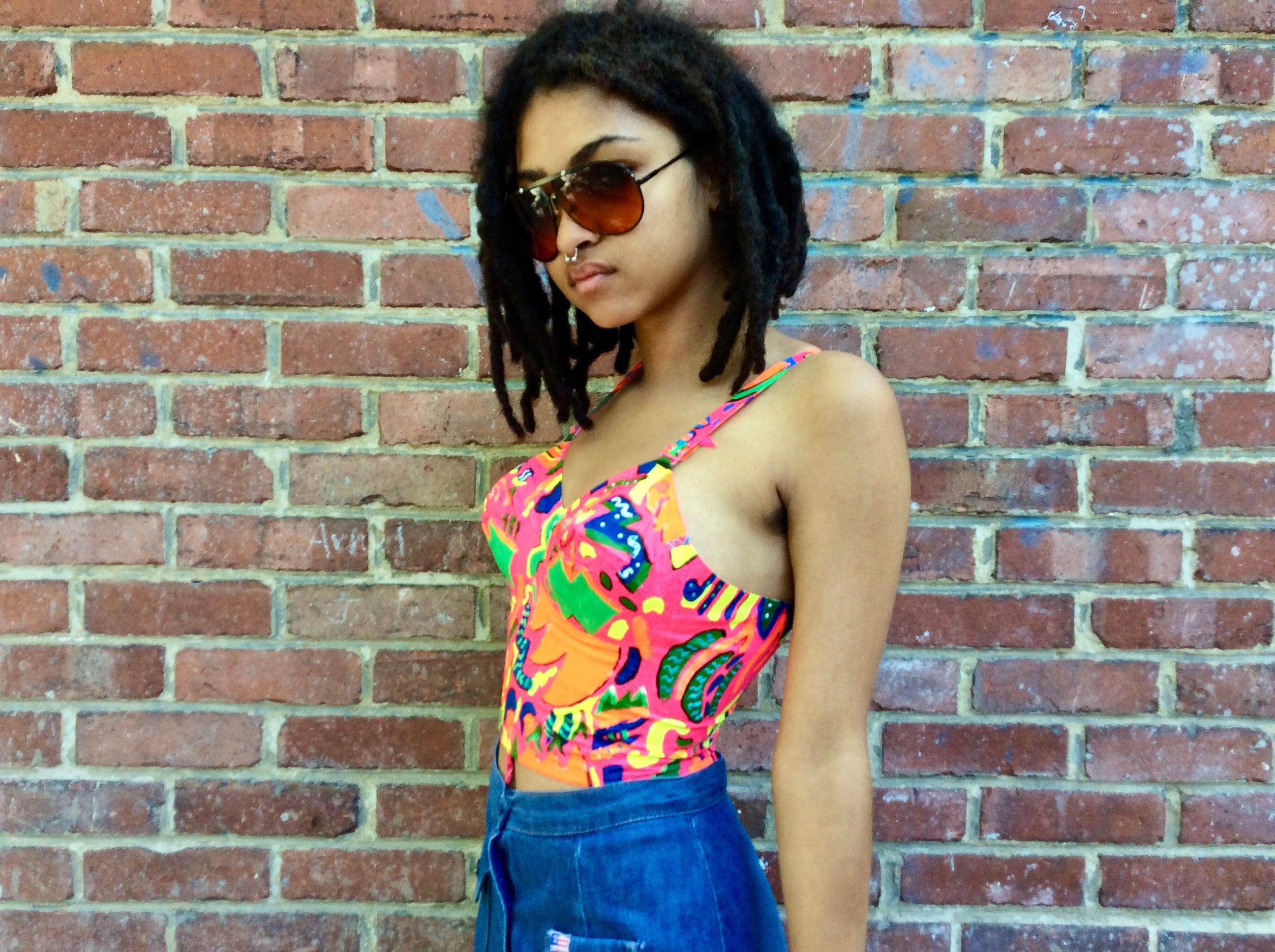 Side view of 1960s Upcycled Hand Painted Bustier Top 
size Small, sold at bohemevintage.com
Montréal