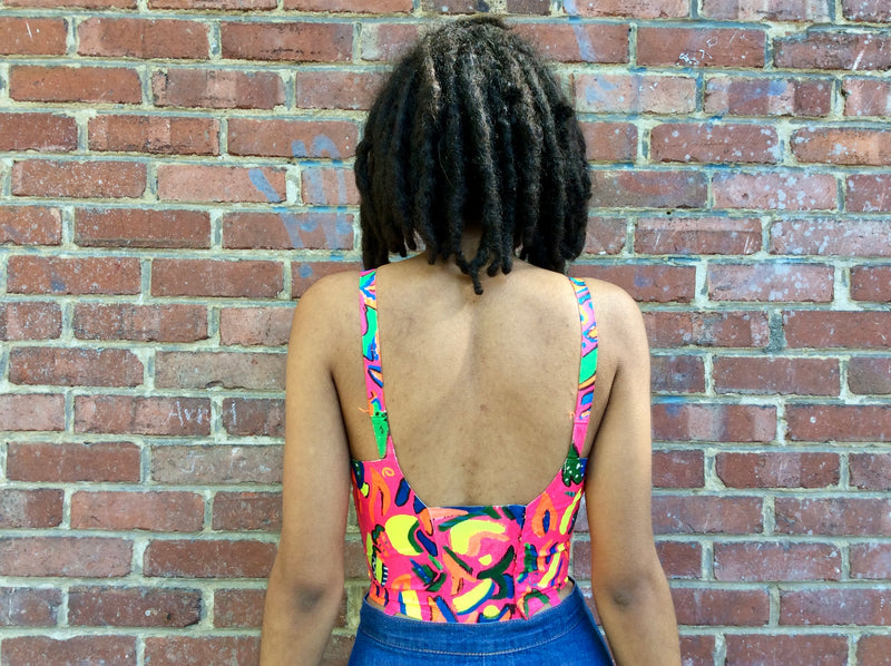 Back view of 1960s Upcycled Hand Painted Bustier Top 
size Small, sold at bohemevintage.com
Montréal