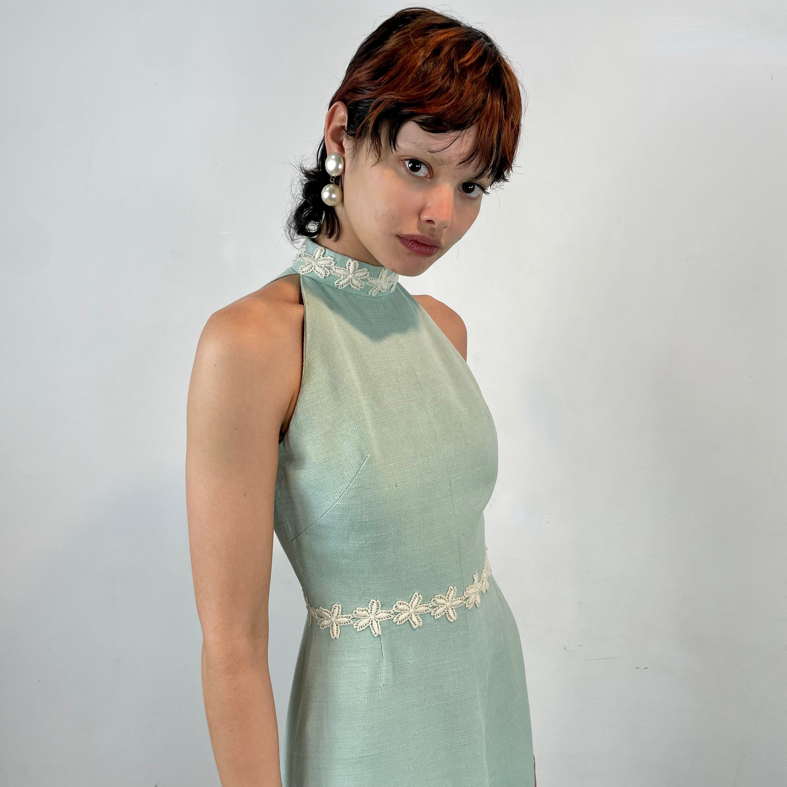 Boheme Vintage 1970s handmade cotton dress with embroidered floral neckline, fitted bodice, and flared skirt.