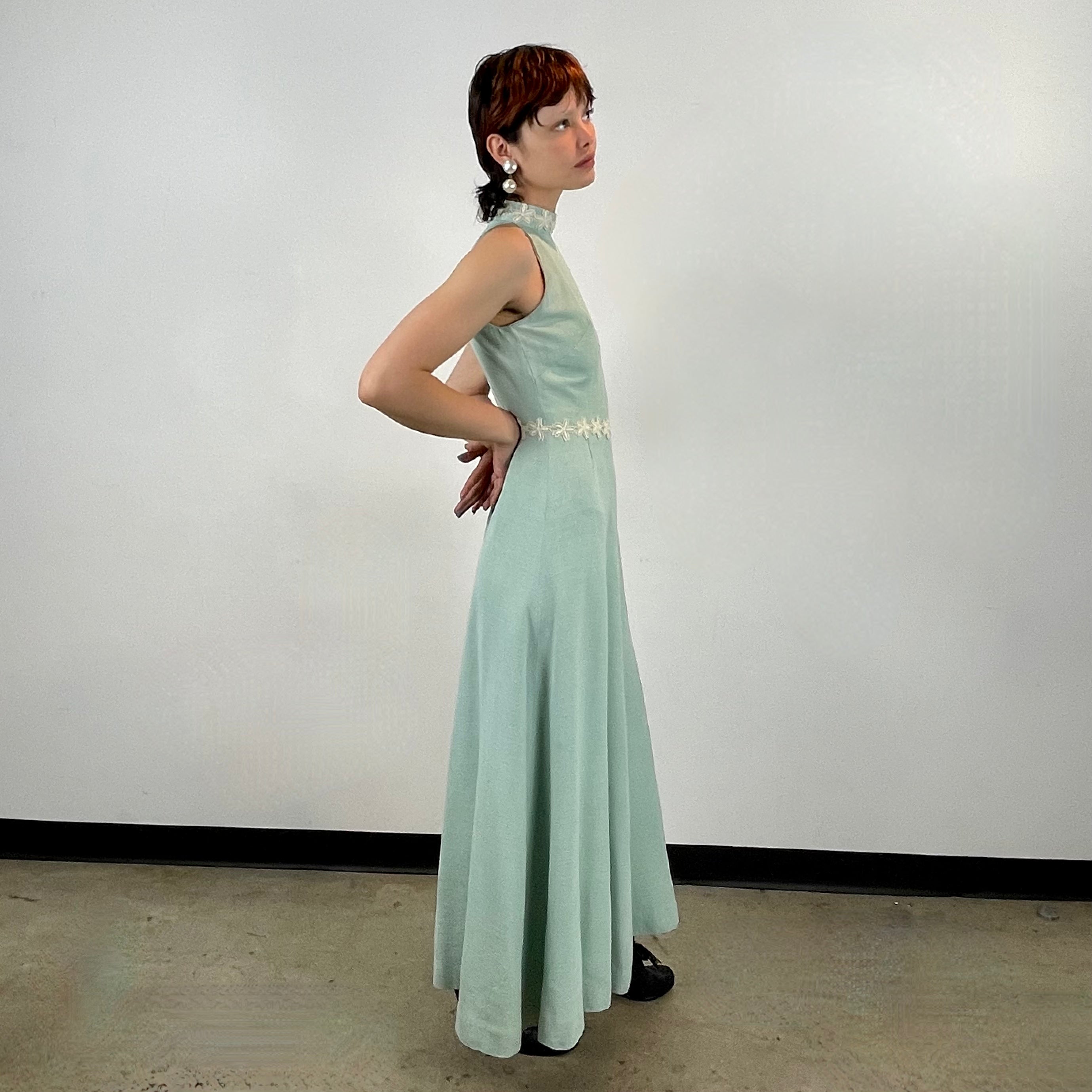 Boheme Vintage 1970s handmade cotton dress with embroidered floral neckline, fitted bodice, and flared skirt.