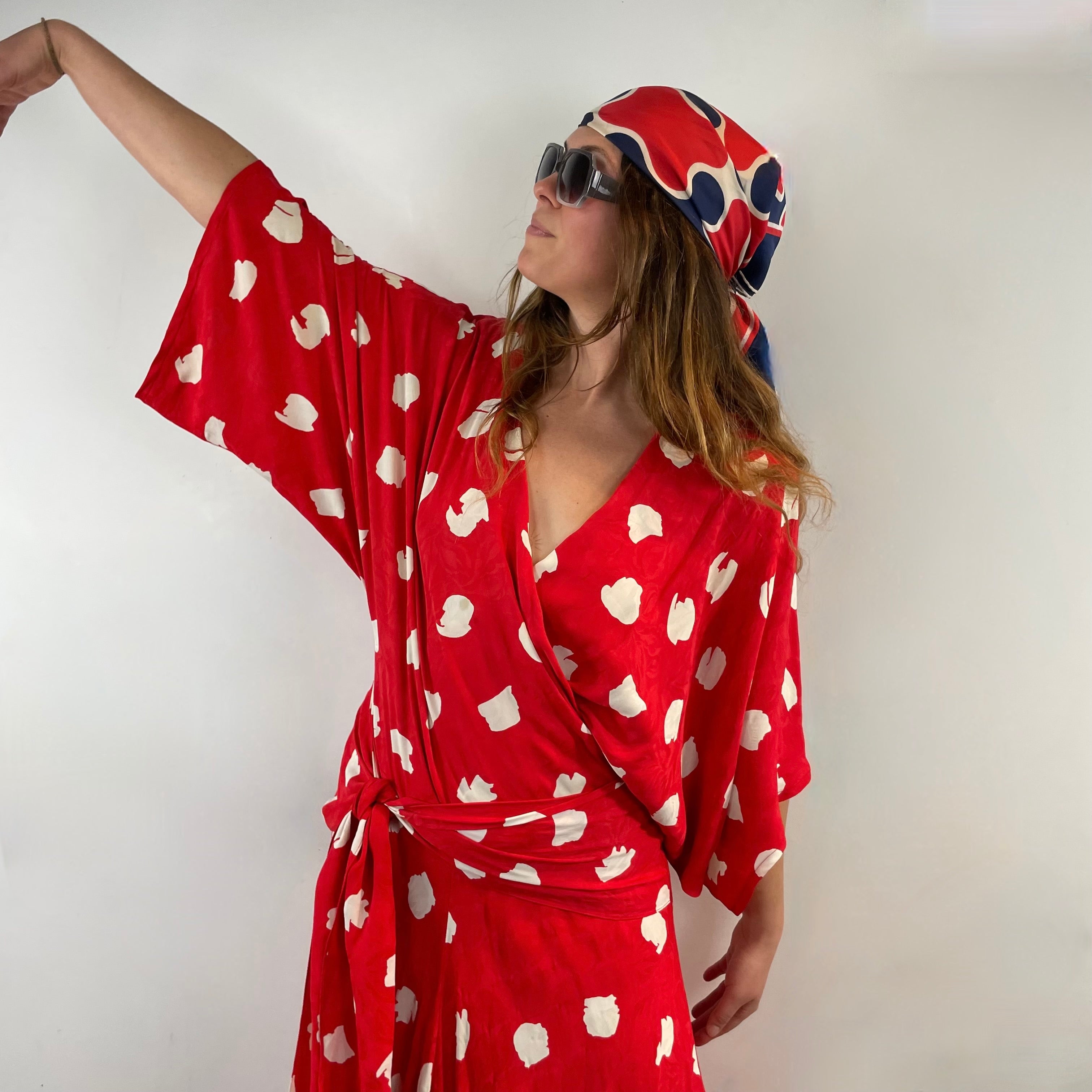 Boheme Vintage 1980s Jackie Bernard for EKLEKTIC red and white viscose kimono-style midi wrap dress with dolman sleeves and pleated skirt.