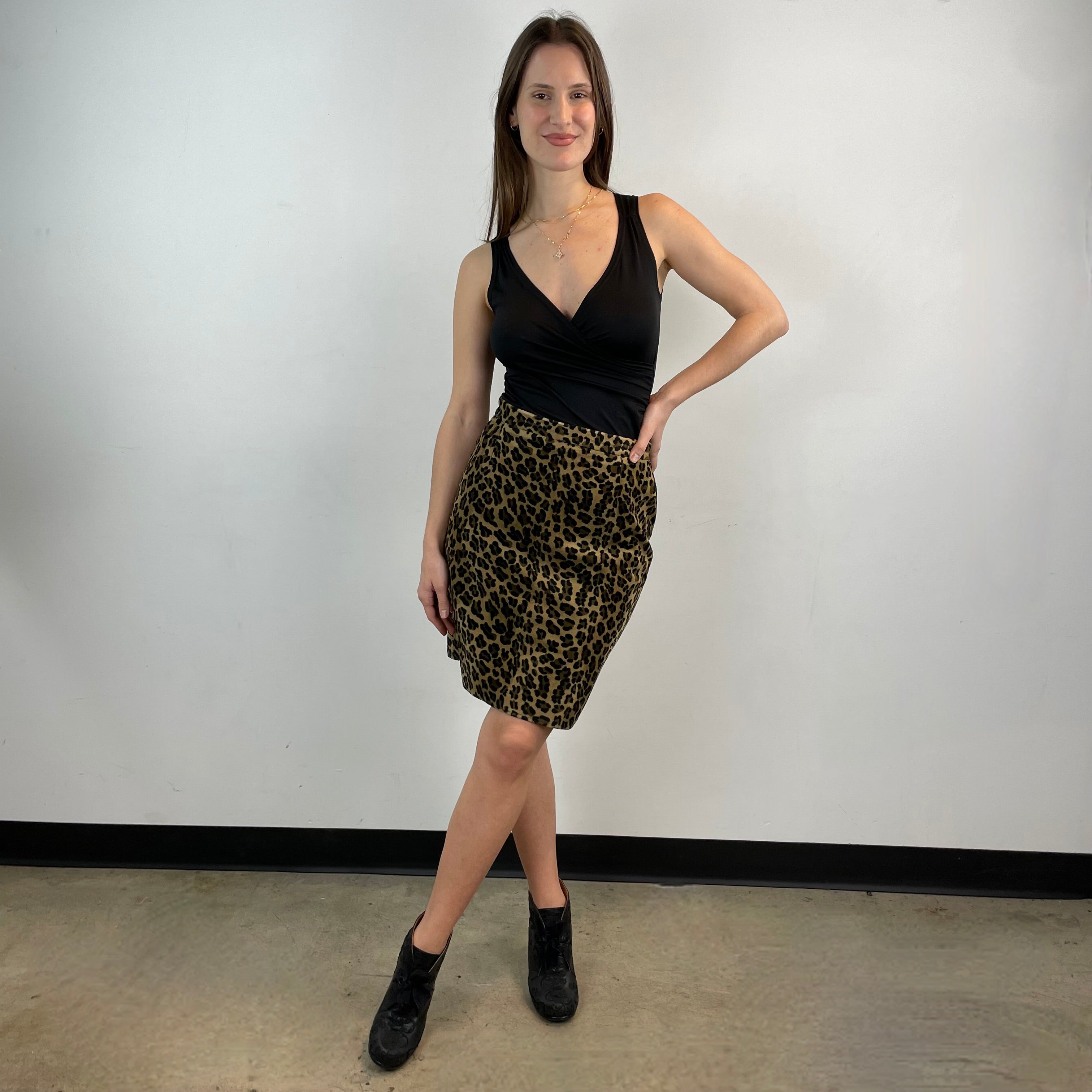  Front view of 1990's Knee-Length Leopard Print Velvet Skirt Size Small/ Medium sold at bohemevintage.com Montreal