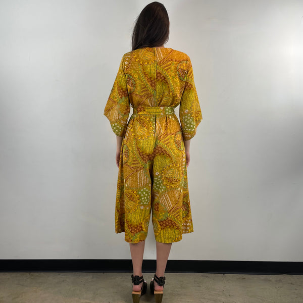 Back view of 1970s Bold Print Cropped Jumpsuit 
One Size
Sold at bohemevintage.com, Montréal