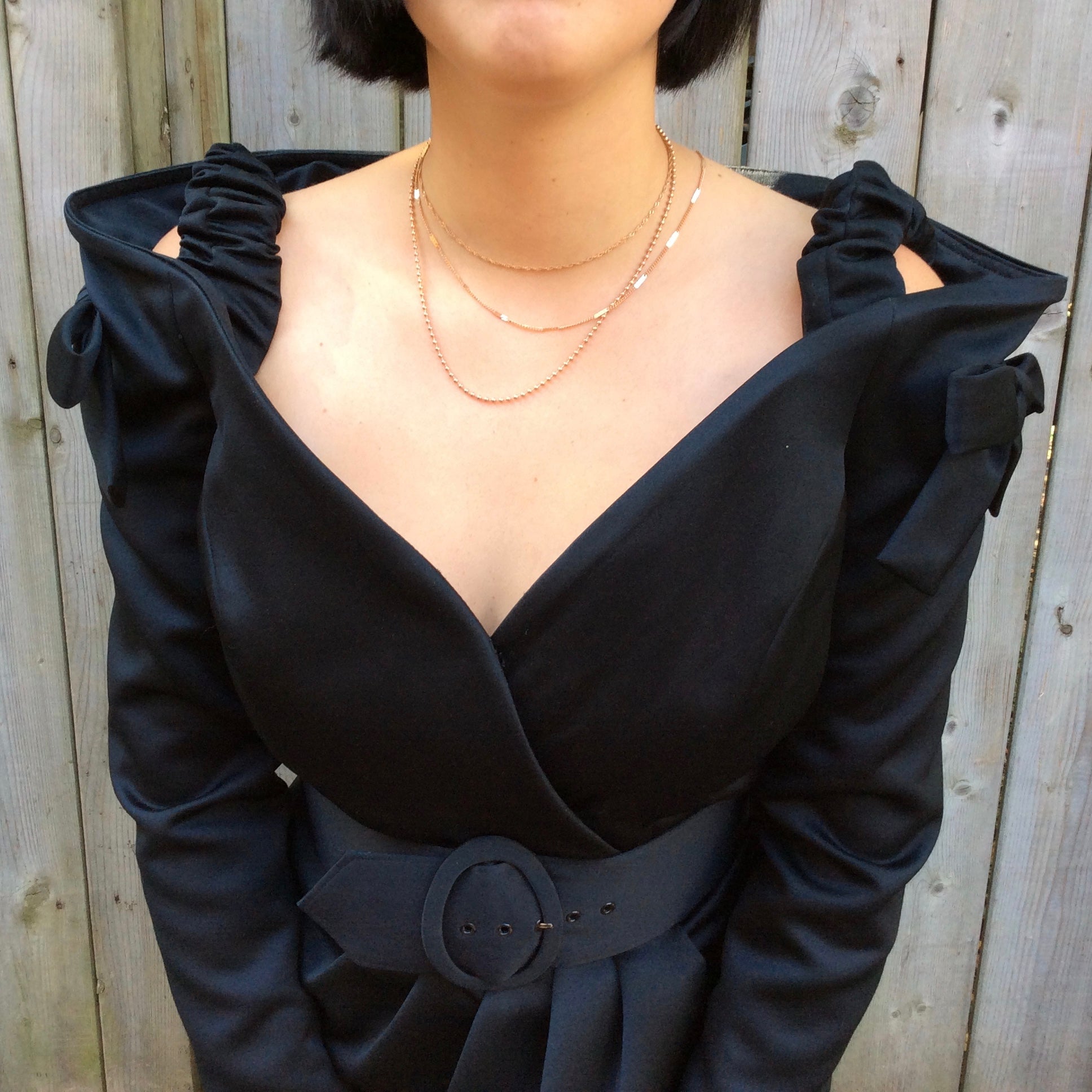 Close up view of 1990s Victor Costa Off-Shoulder Long Sleeve Black Dress
Size medium, sold at bohemevintage.com, Montréal