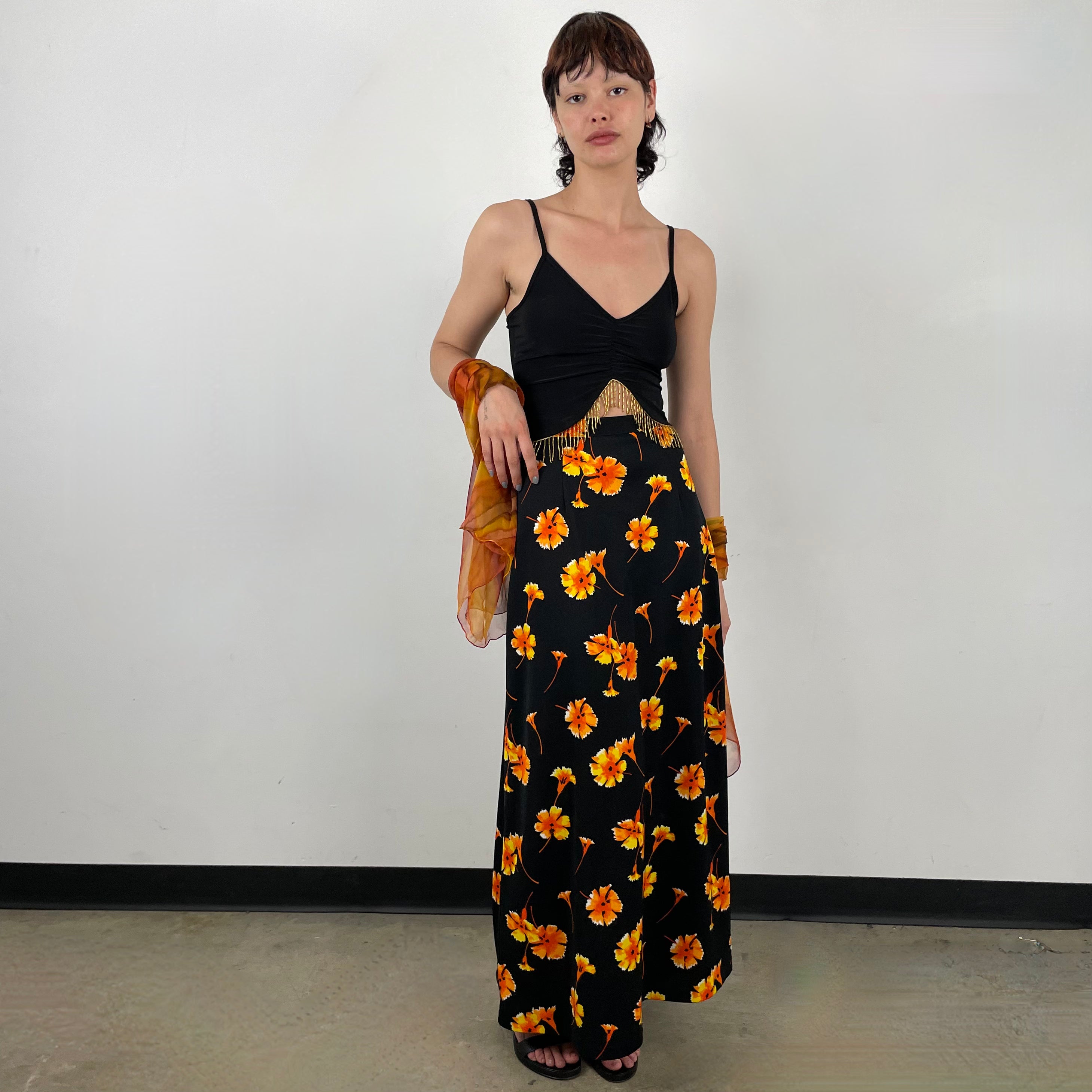 Front view of 70s Black Floral Printed Maxi Skirt 
Size Extra Small/Small
Sold at bohemevintage.com 
Montréal 