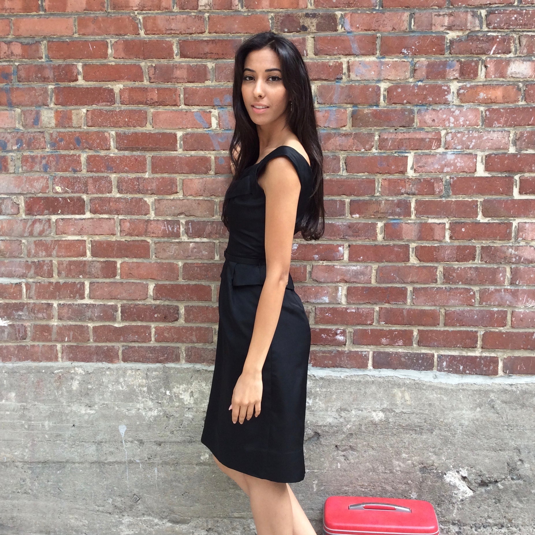 Side view of 1950s Black Dress With Peplum 
Size Extra-Small/Small 
Sold at bohemevintage.com
Montréal