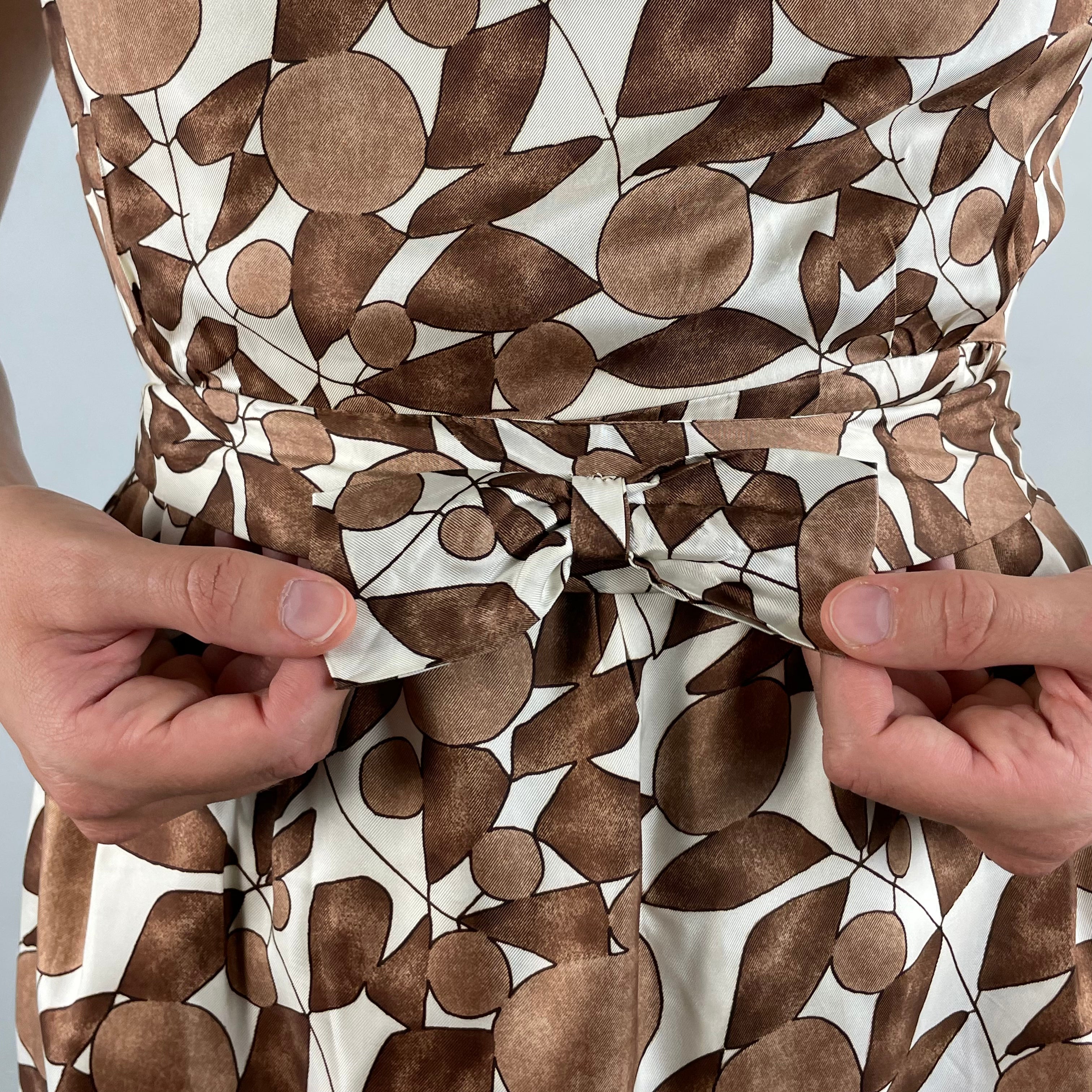 close up front view of 1960s Sleeveless Back Cowl Neck Satin Dress 
size Small
sold at bohemevintage.com
Montréal