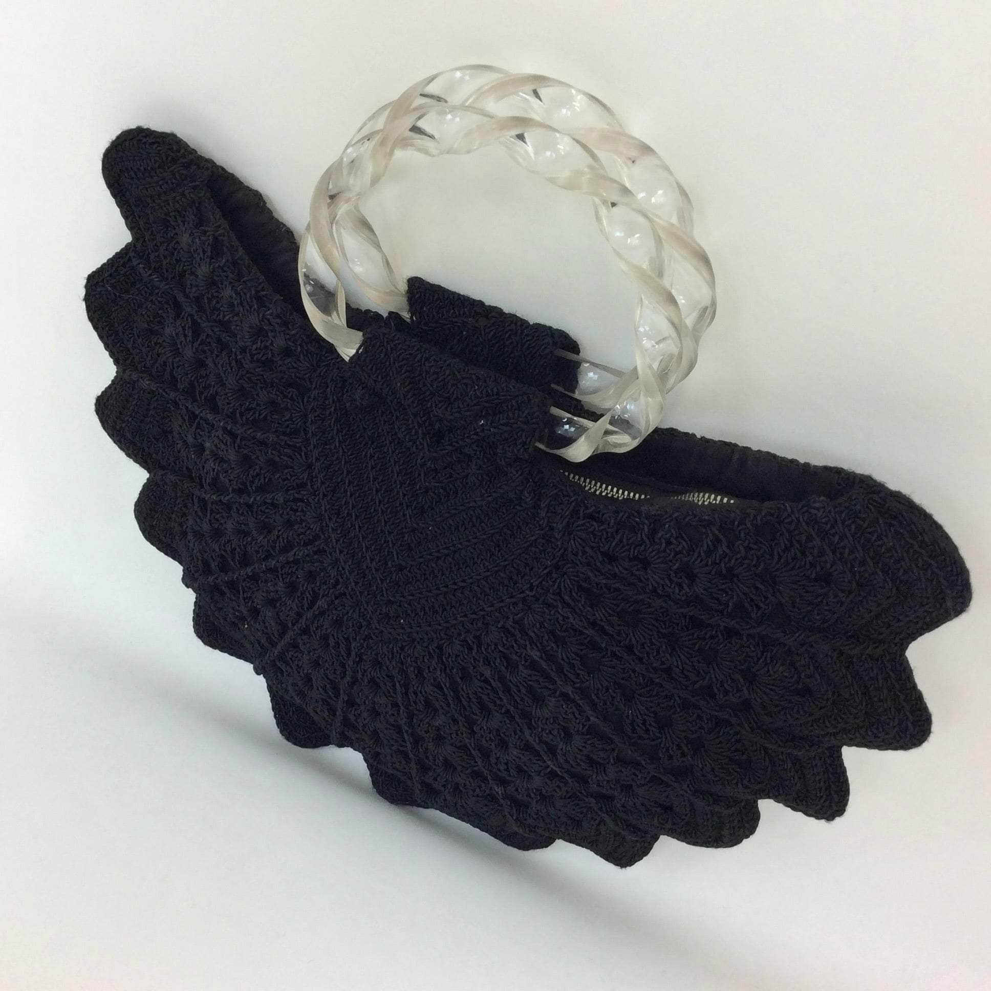 Boheme Vintage 1940s black crochet peacock‑shape evening handbag with clear twisted lucite handles and zipper closure.
