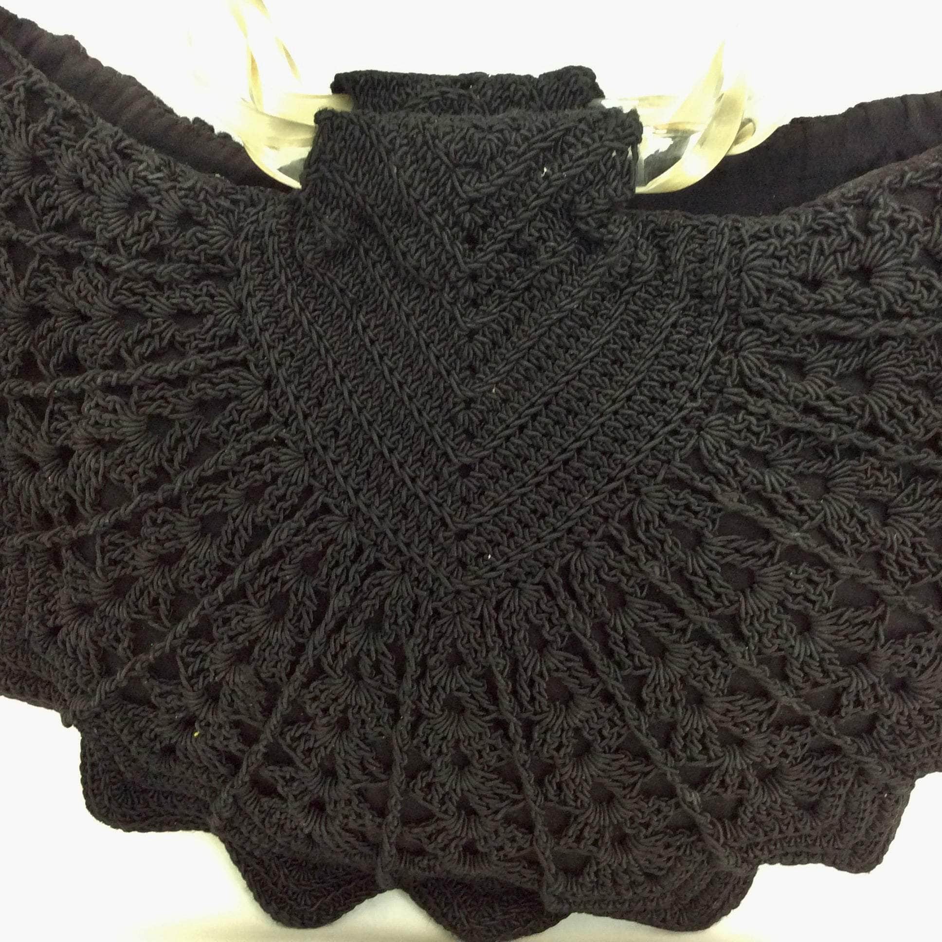 Boheme Vintage 1940s black crochet peacock‑shape evening handbag with clear twisted lucite handles and zipper closure.