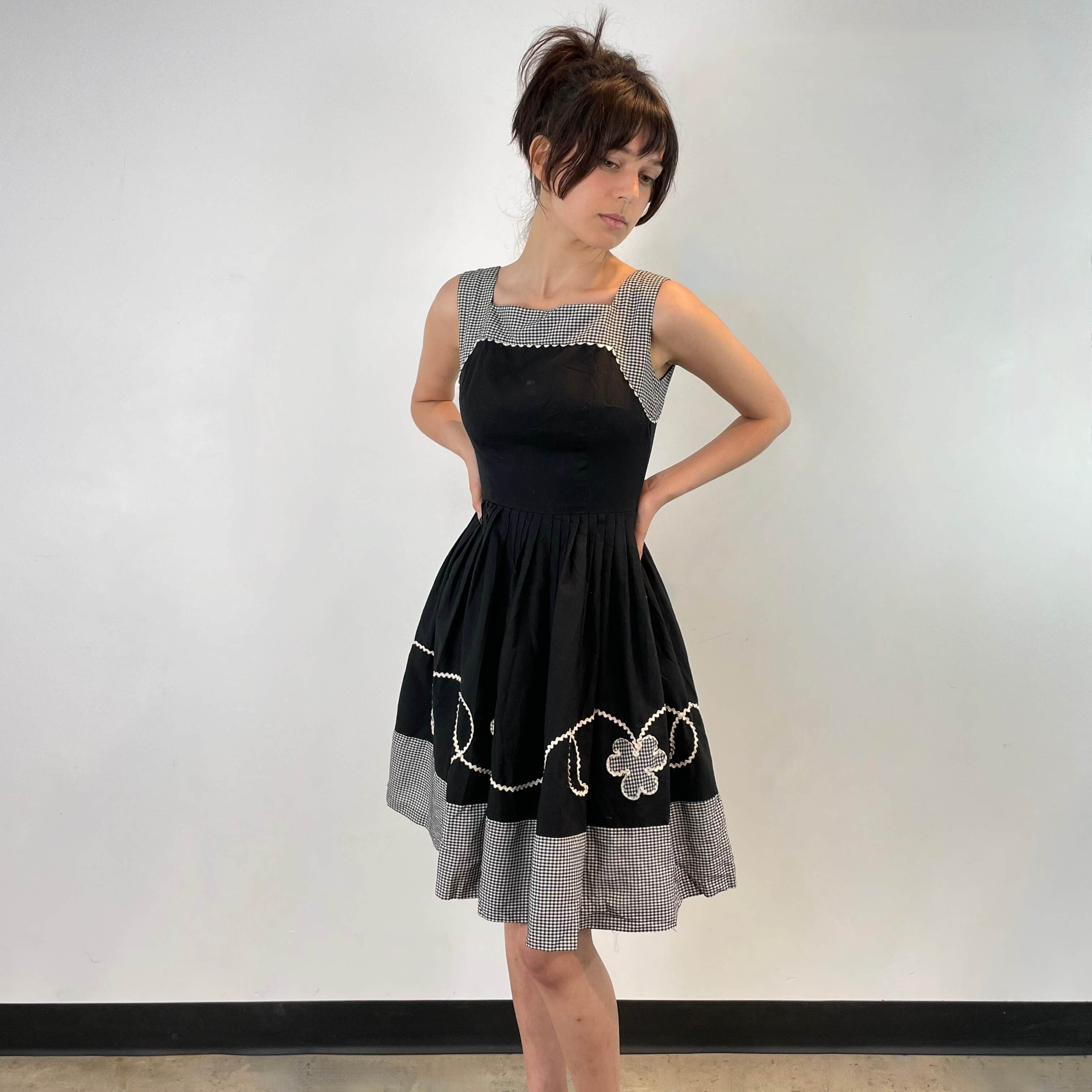 Back view of 1950s Black and White Cotton Petite Dress size Extra-Small sold on bohemevintage.com Montreal