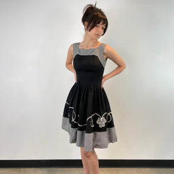 Back view of 1950s Black and White Cotton Petite Dress size Extra-Small sold on bohemevintage.com Montreal