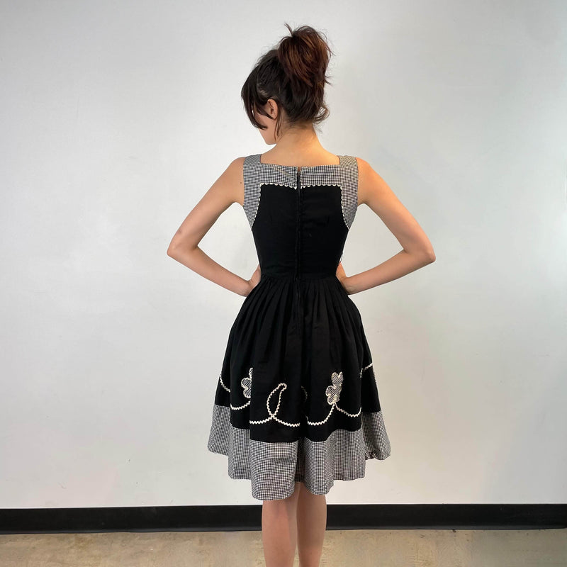 Back view of 1950s Black and White Cotton Petite Dress size Extra-Small sold on bohemevintage.com Montreal